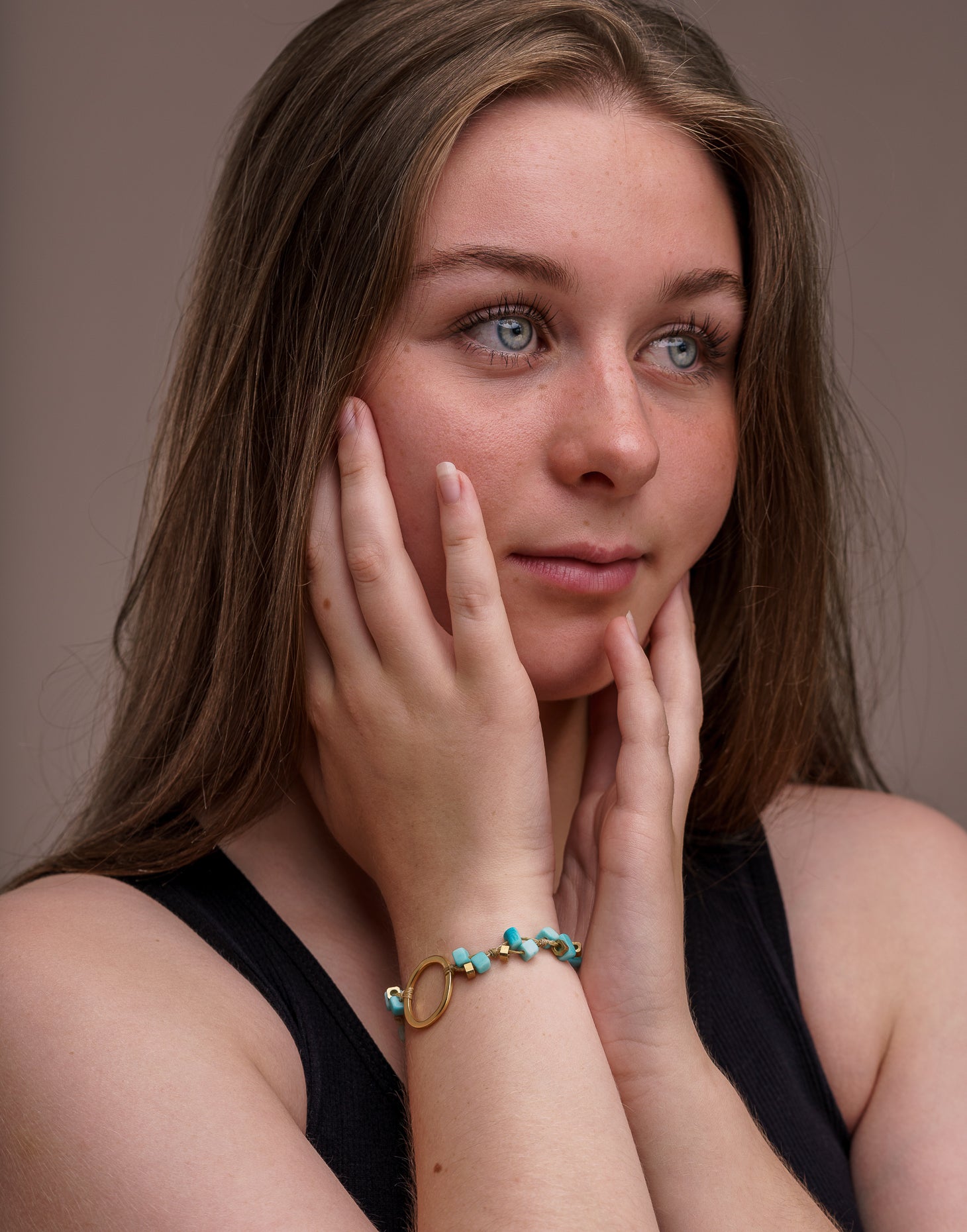 A delicate Dainty Tagua Bracelet featuring mini tagua squares and brass details, elegantly displayed on a soft background.