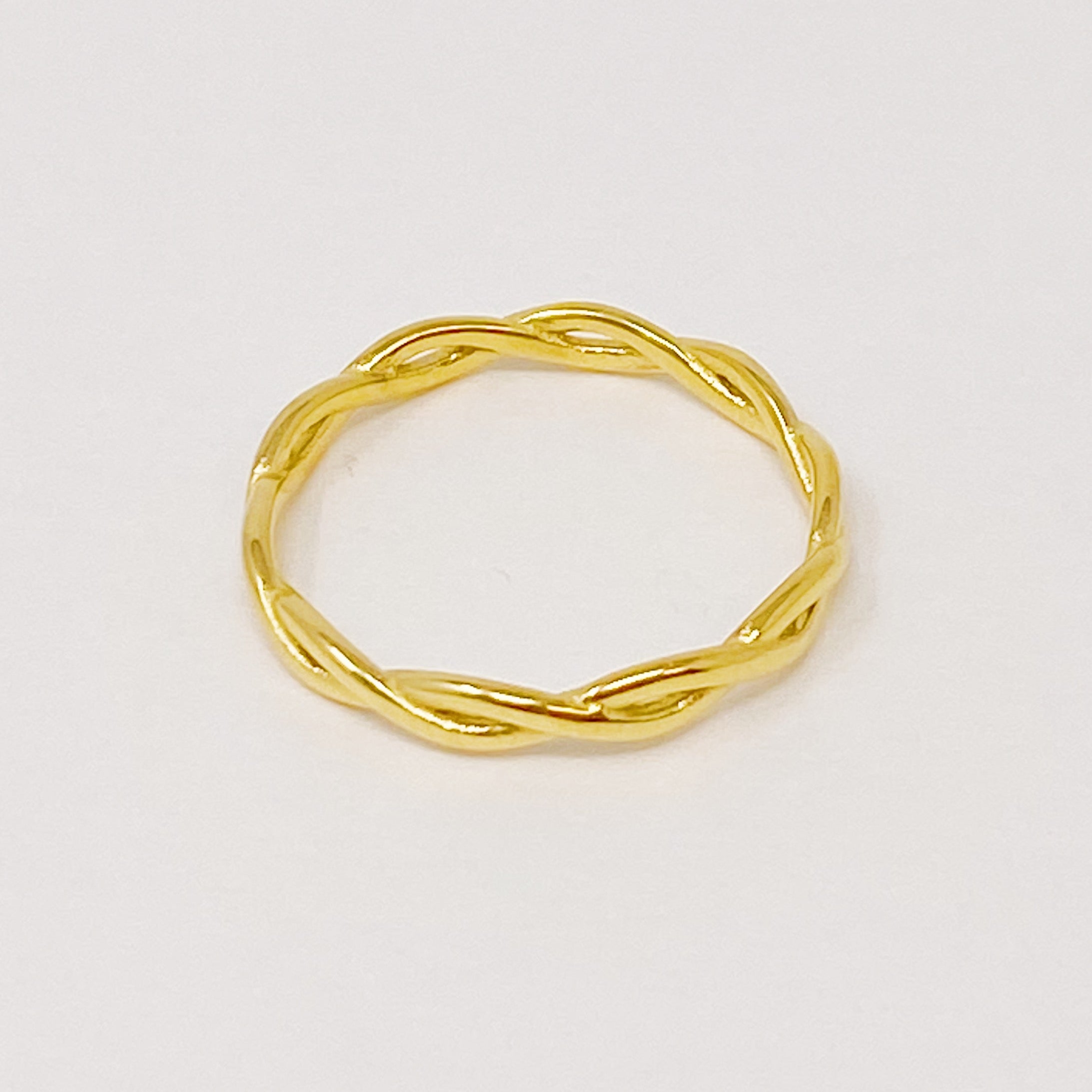 Dainty Twisted Rope Ring in gold plated stainless steel, featuring a delicate twisted design, perfect for layering or wearing alone.