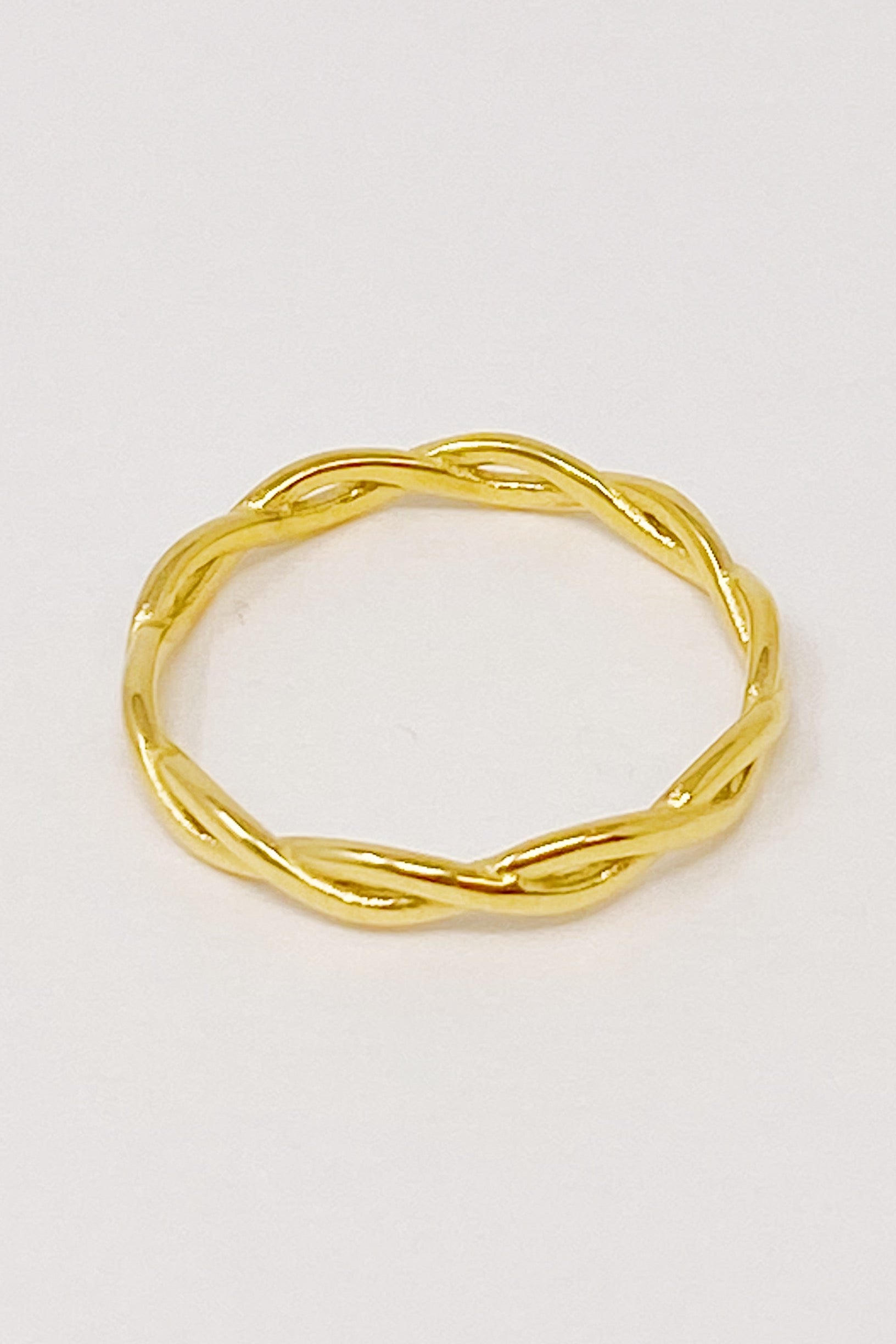 Dainty Twisted Rope Ring in gold plated stainless steel, featuring a delicate twisted design, perfect for layering or wearing alone.