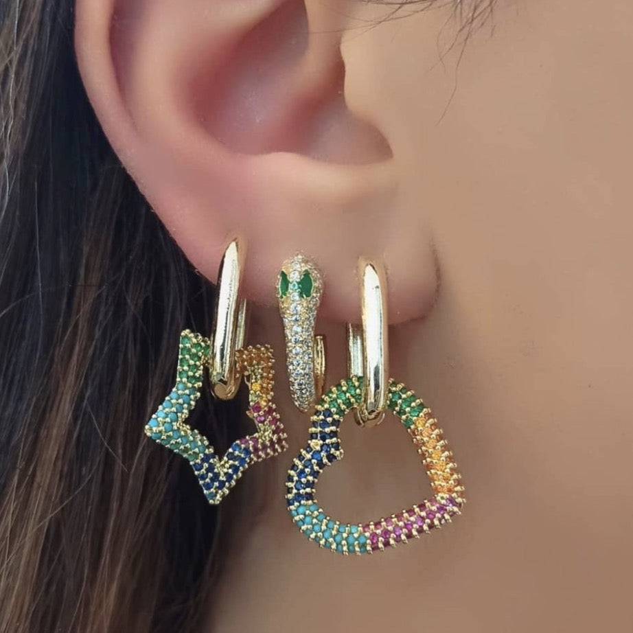 A pair of handmade dangle earrings featuring rainbow zircon stones with heart and star charms, elegantly designed in gold color.