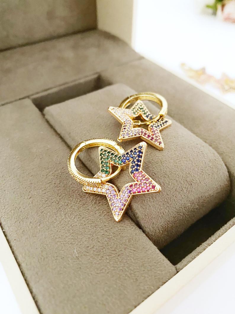 A pair of elegant gold Dangle Star Earrings featuring rainbow zircon stones, perfect for special occasions like Valentine's Day and weddings.