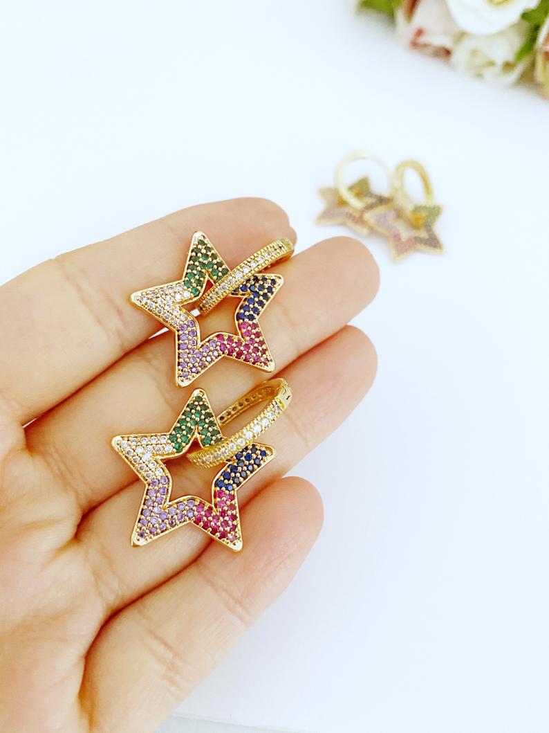 A pair of elegant gold Dangle Star Earrings featuring rainbow zircon stones, perfect for special occasions like Valentine's Day and weddings.