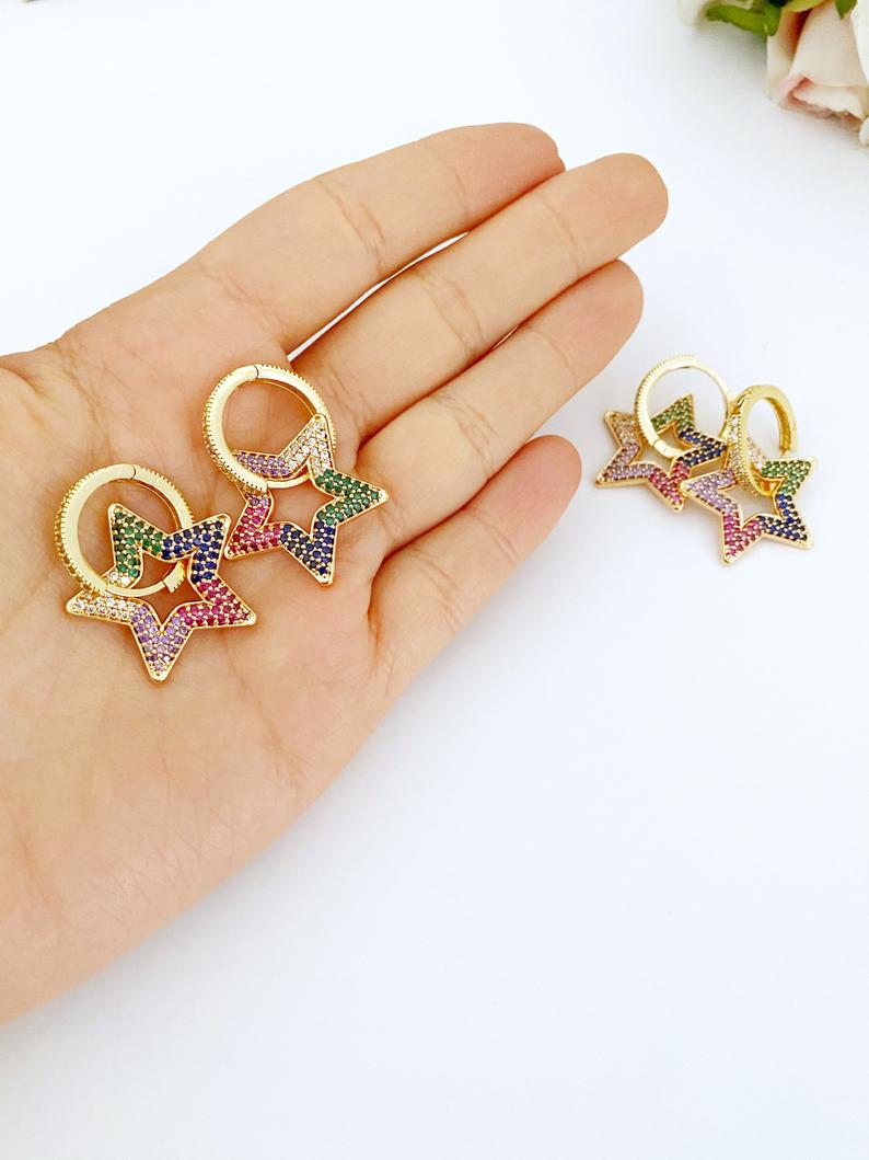 A pair of elegant gold Dangle Star Earrings featuring rainbow zircon stones, perfect for special occasions like Valentine's Day and weddings.