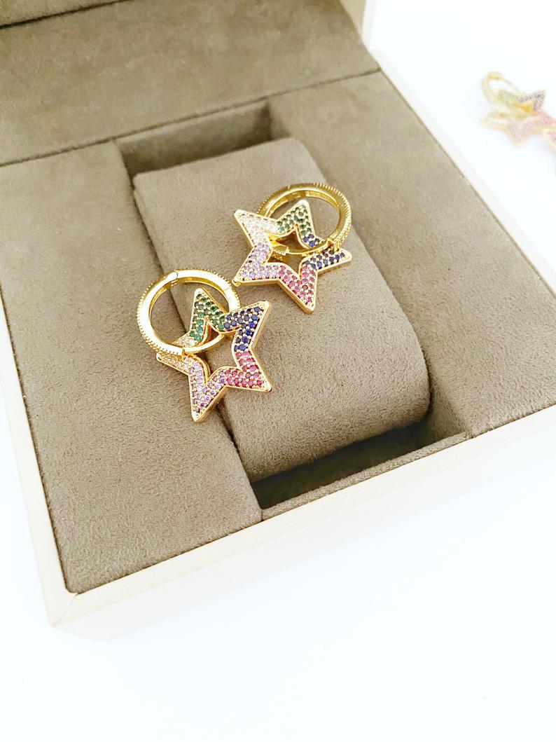 A pair of elegant gold Dangle Star Earrings featuring rainbow zircon stones, perfect for special occasions like Valentine's Day and weddings.