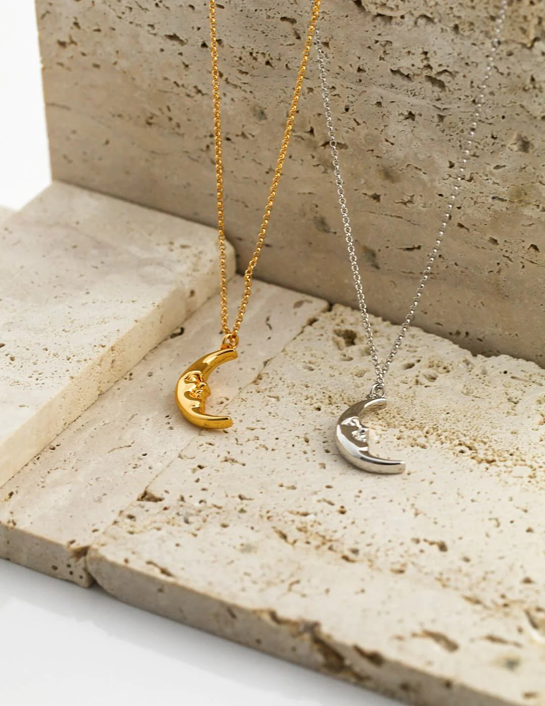 Delicate Crescent Moon Pendant Necklace made of sterling silver with gold vermeil plating, showcasing its elegant crescent moon design.