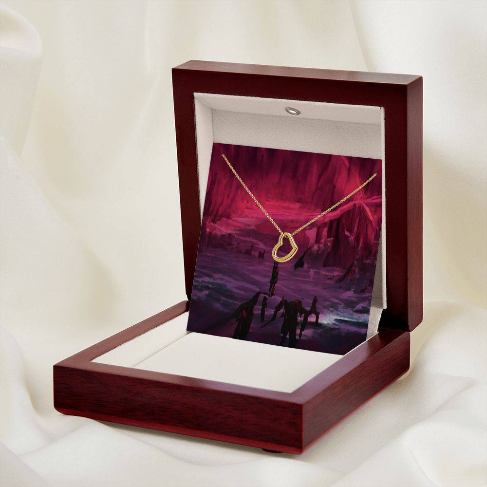 Delicate Heart Necklace in sterling silver with gold dip, showcasing its elegant heart pendant and adjustable chain.