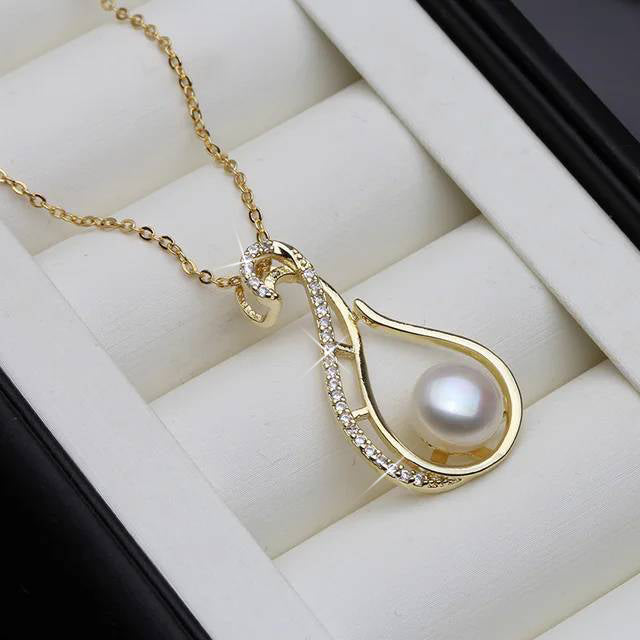 Designer Freshwater Pearl Twirl Simulated Diamond Necklace in Gold featuring high-quality pearls and sparkling simulated diamonds.