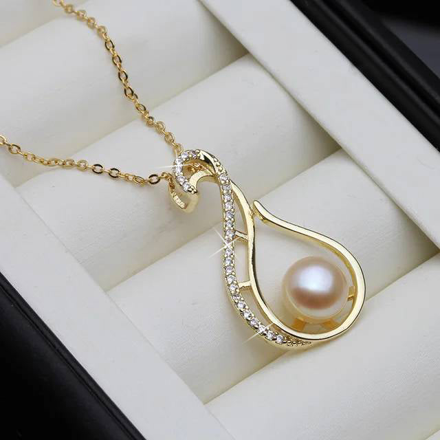 Designer Freshwater Pearl Twirl Simulated Diamond Necklace in Gold featuring high-quality pearls and sparkling simulated diamonds.