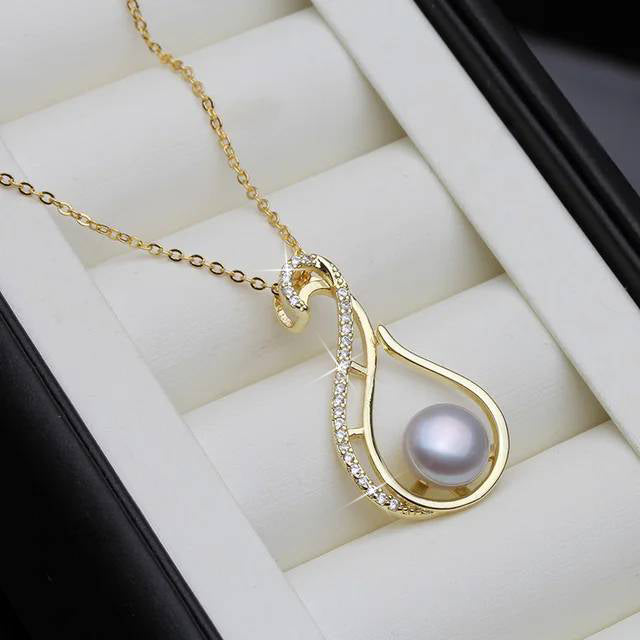 Designer Freshwater Pearl Twirl Simulated Diamond Necklace in Gold featuring high-quality pearls and sparkling simulated diamonds.
