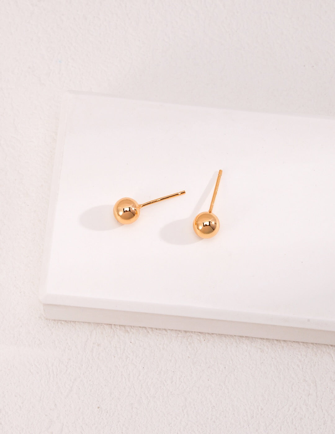 Elegant Detachable Four Row Drop Pearl Earrings featuring natural pearls and gold vermeil, showcasing a luxurious design.