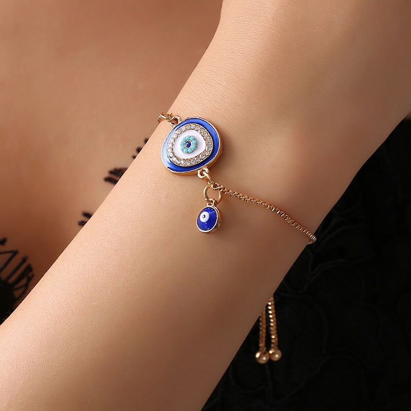 A collection of Devil's Eye bracelets made from alloy, showcasing intricate designs and a protective symbol.