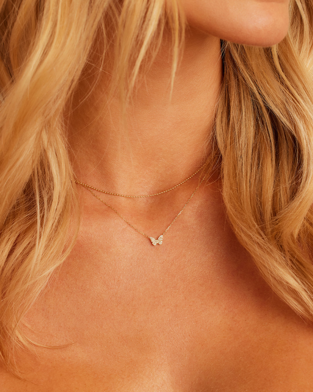 A stunning Diamond Butterfly Necklace featuring intricate butterfly design with sparkling lab-grown diamonds.