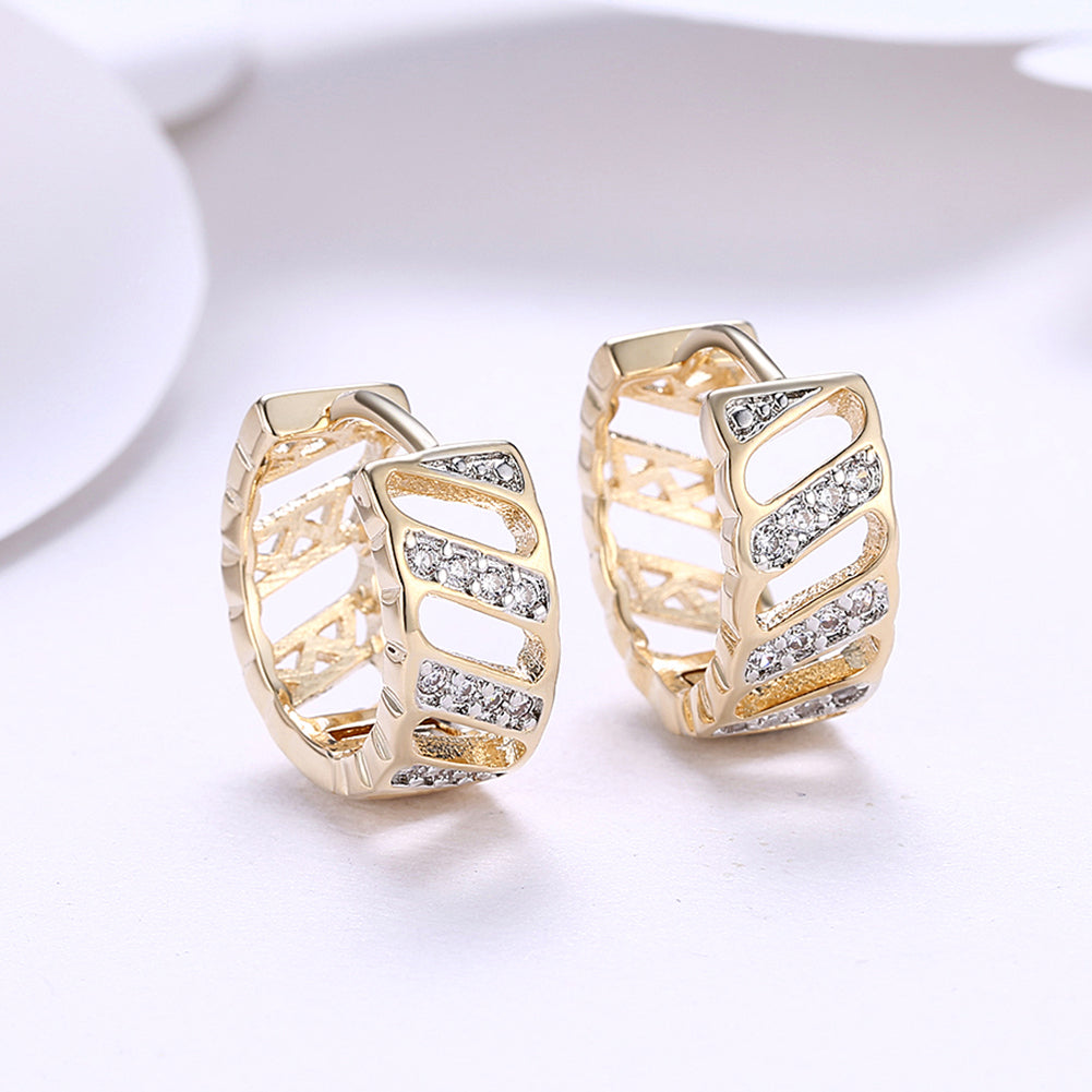 Elegant Diamond Cut Opening Huggie Earring in 18K Gold Plated, showcasing its unique design and luxurious finish.