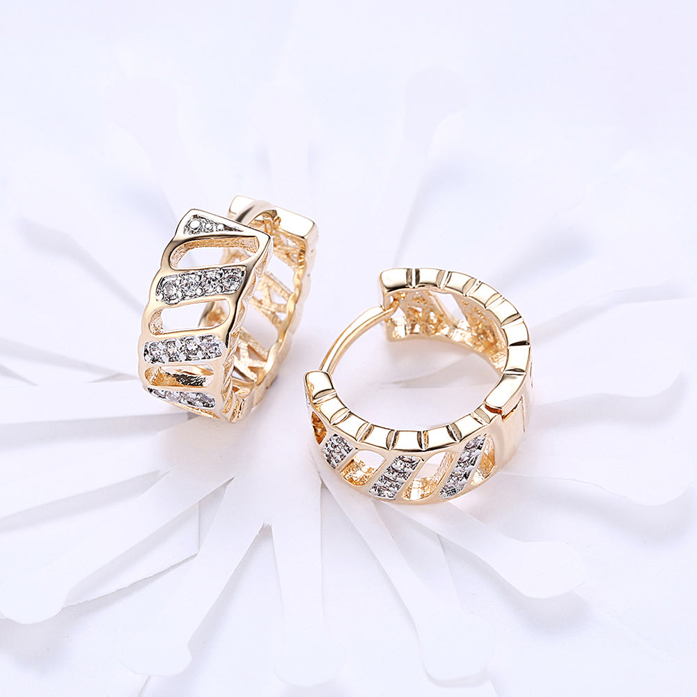 Elegant Diamond Cut Opening Huggie Earring in 18K Gold Plated, showcasing its unique design and luxurious finish.
