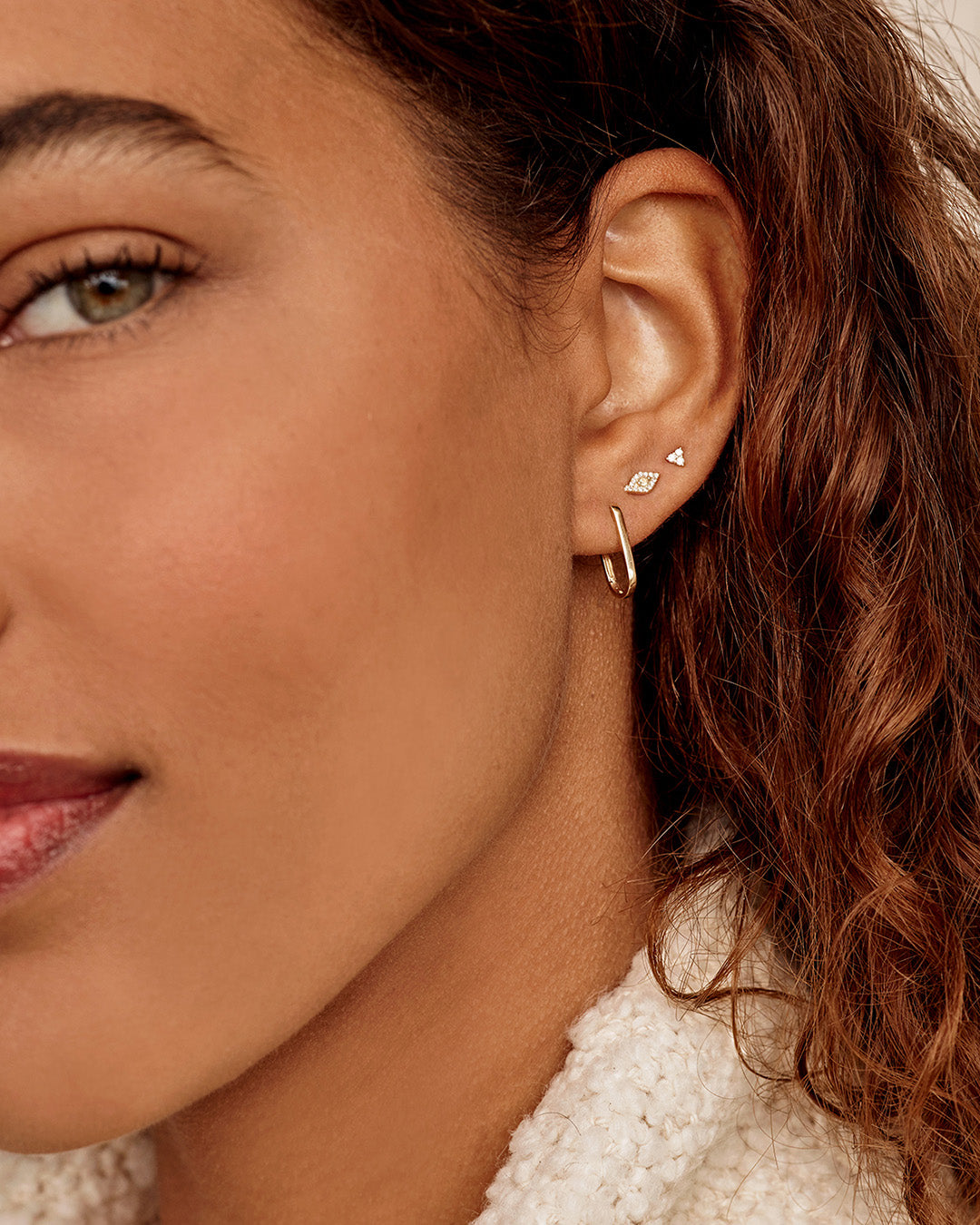 Elegant Diamond Evil Eye Studs featuring sparkling diamonds set in a protective evil eye design.