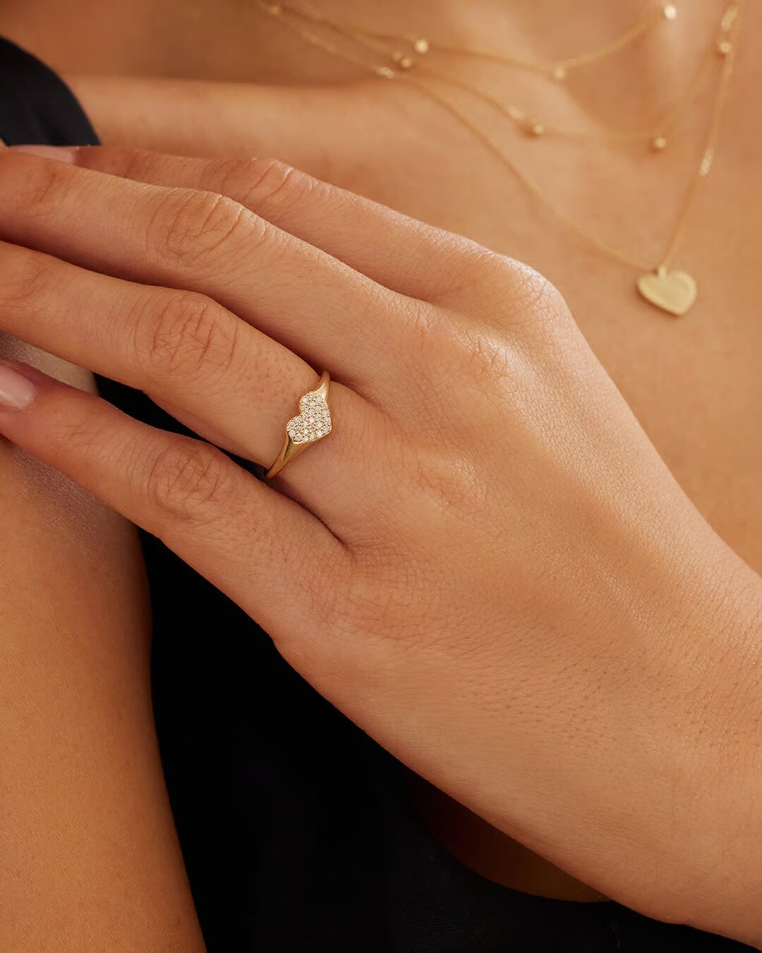 Elegant Diamond Heart Signet Ring crafted from solid gold with intricate diamond detailing and a romantic heart design.