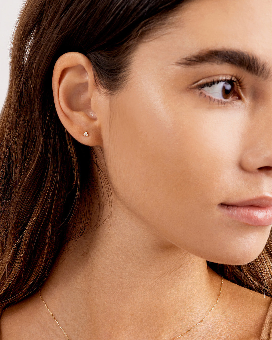 Elegant Diamond Jolie Studs featuring six lab-grown diamonds with a total weight of 0.10 CT, showcasing a timeless design.