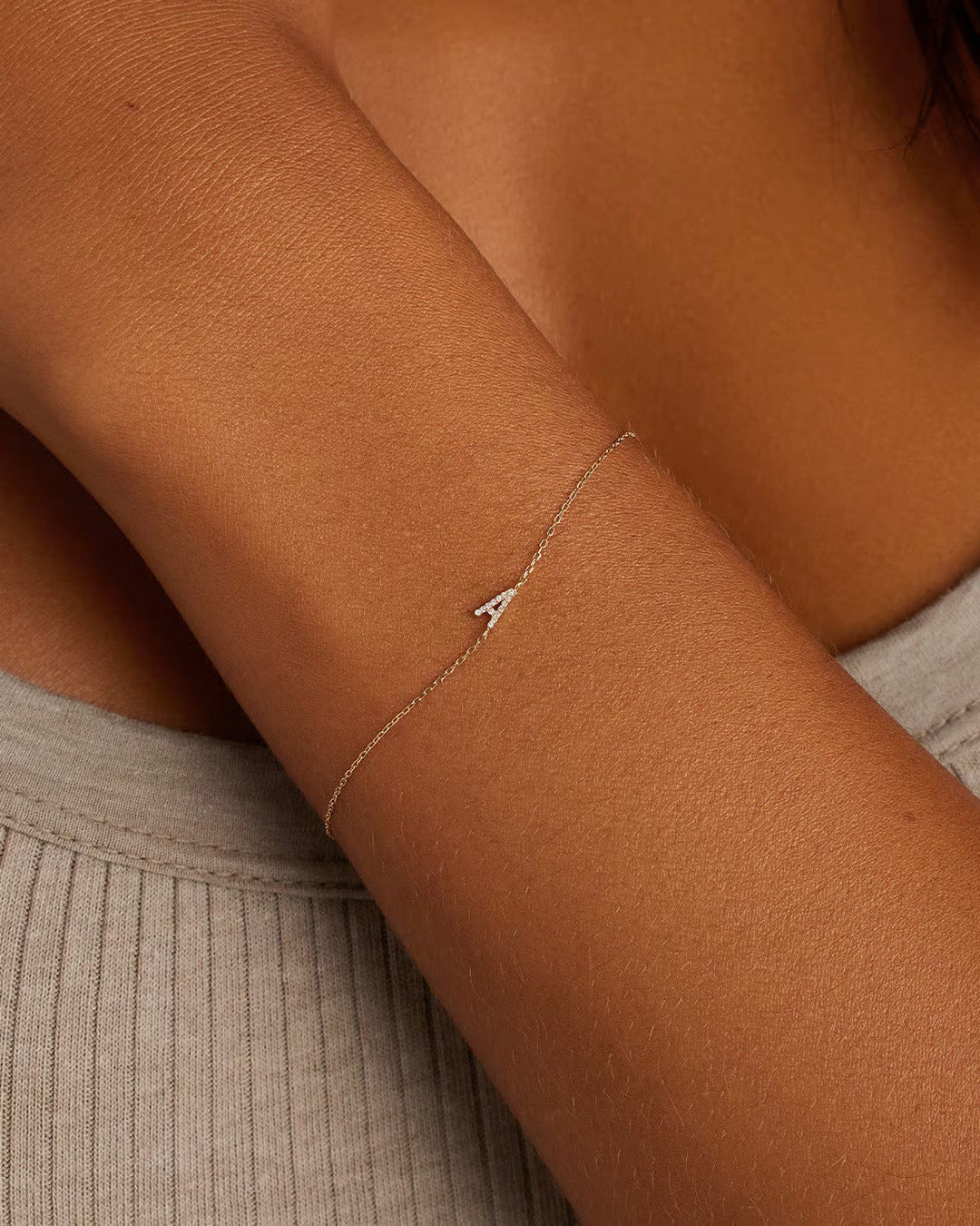 Elegant Diamond Pavé Alphabet Bracelet featuring a personalized initial design with sparkling lab-grown diamonds set in solid gold.