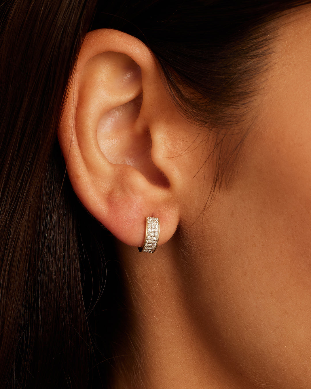 Elegant Diamond Rose Huggies featuring sparkling diamonds and a delicate rose design, perfect for any occasion.