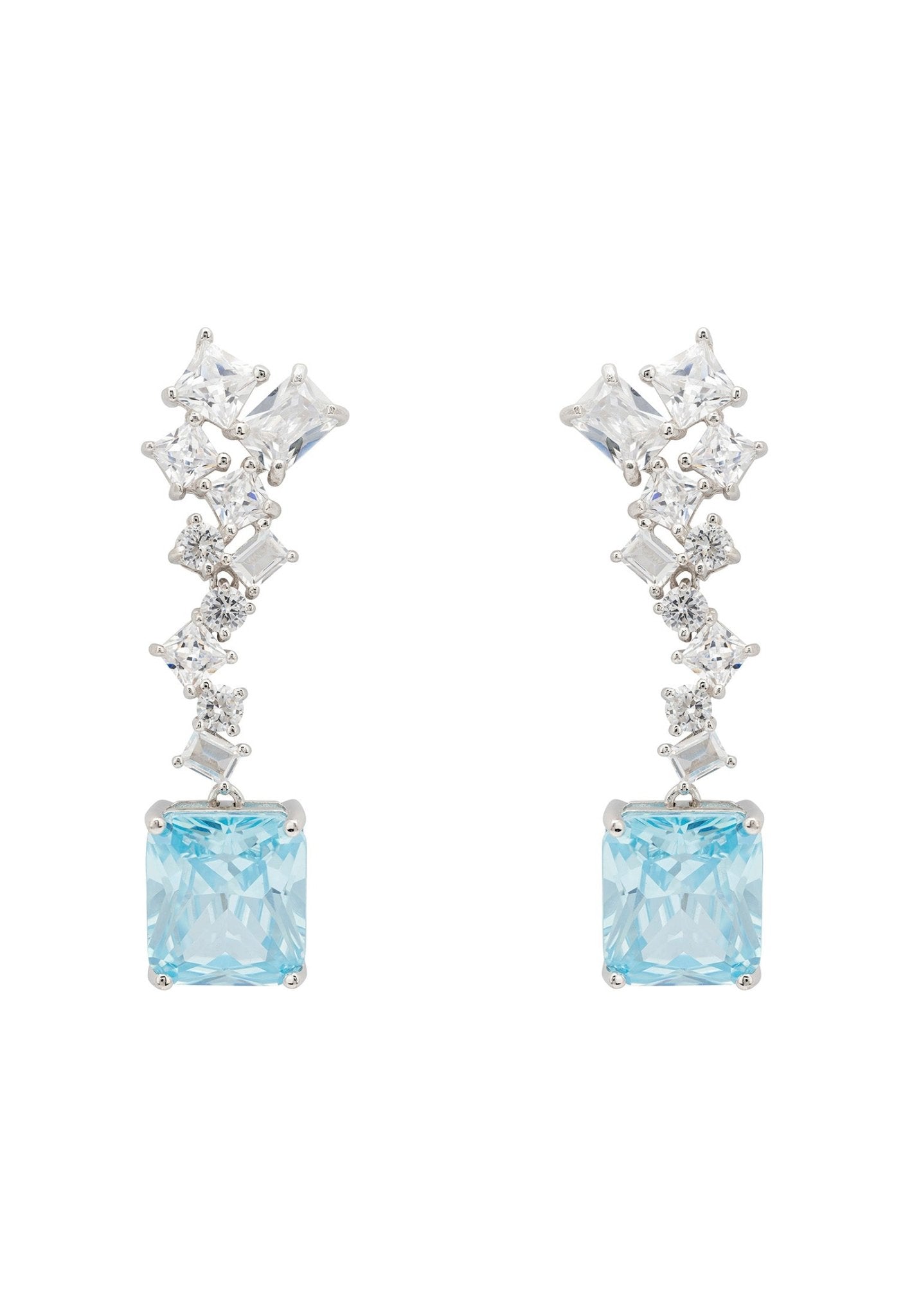 Diana Blue Topaz Drop Earrings in silver featuring a large rectangular blue topaz gemstone and intricate zig-zag design with simulated diamonds.