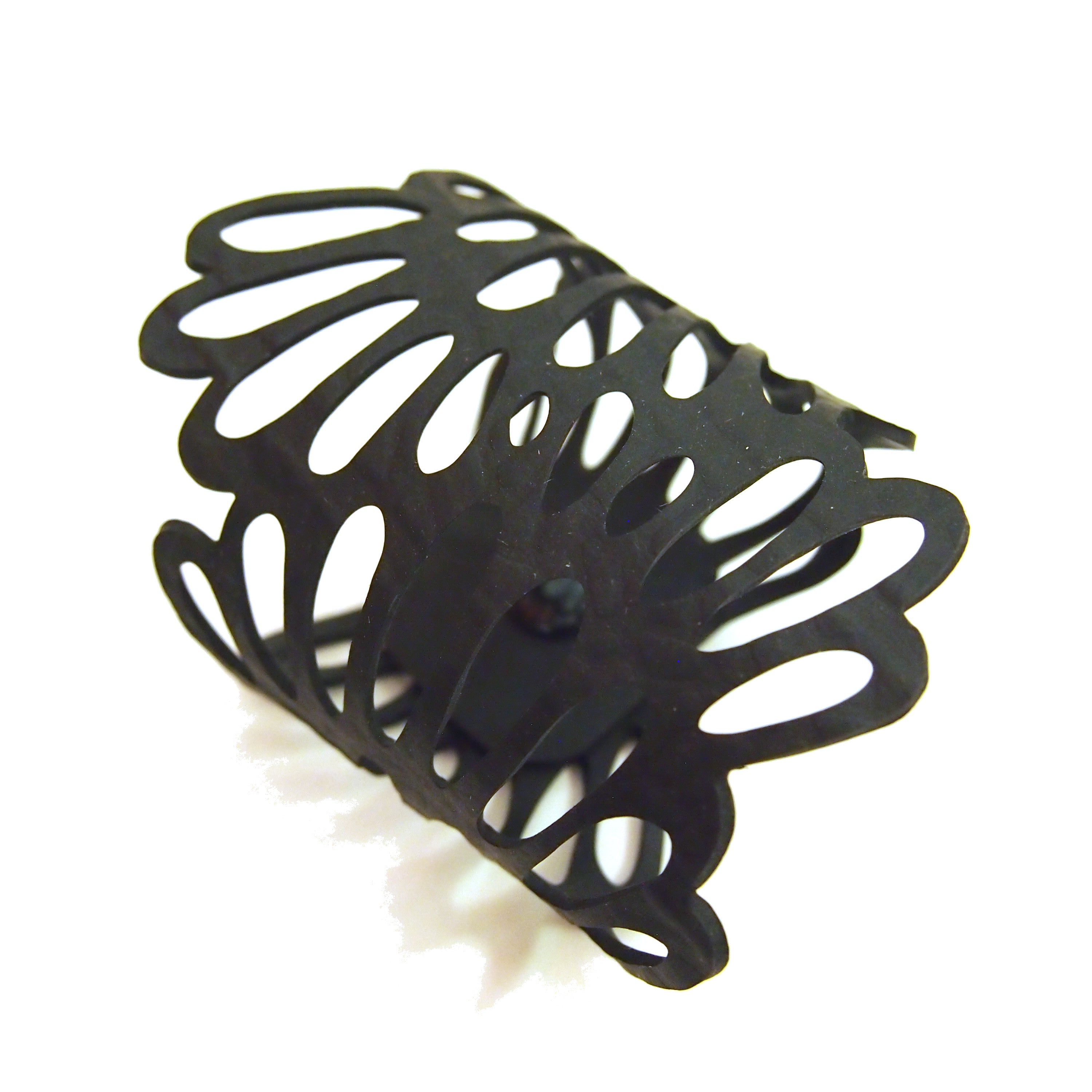 Dianne Recycled Rubber Bracelet handcrafted from reclaimed inner tubes, showcasing unique textures and patterns.