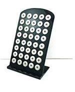 Ginger Snap Jewelry Display featuring 32 customizable ArtPopper snaps, showcasing various designs and colors.