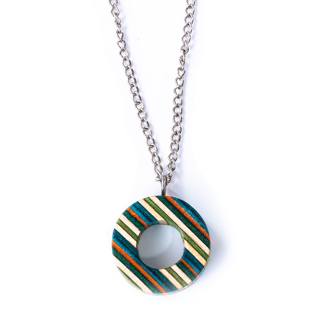 A unique Donut Eco Friendly Recycled Skateboard Necklace featuring vibrant colors and patterns, handcrafted from upcycled skateboards with a stainless steel chain.