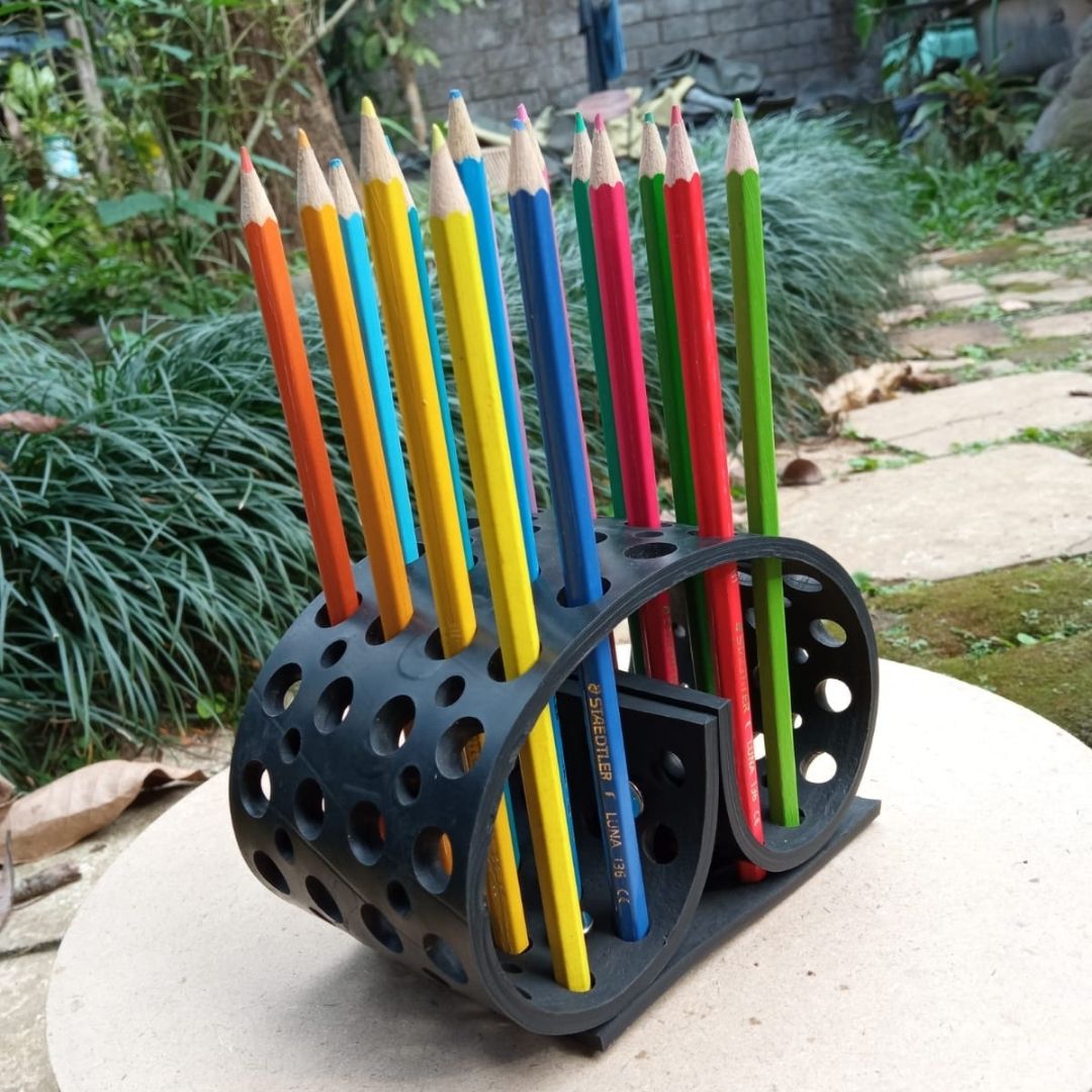Colorful Dotty Eco-Friendly Pencil/Pen Holder made from upcycled rubber, featuring a unique spiky design with multiple holes for organizing pens and brushes.