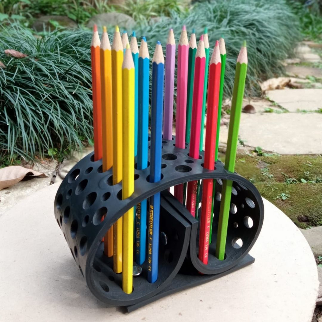 Colorful Dotty Eco-Friendly Pencil/Pen Holder made from upcycled rubber, featuring a unique spiky design with multiple holes for organizing pens and brushes.