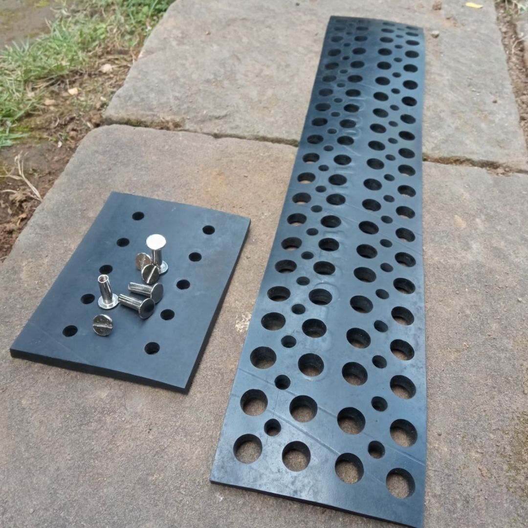 Colorful Dotty Eco-Friendly Pencil/Pen Holder made from upcycled rubber, featuring a unique spiky design with multiple holes for organizing pens and brushes.