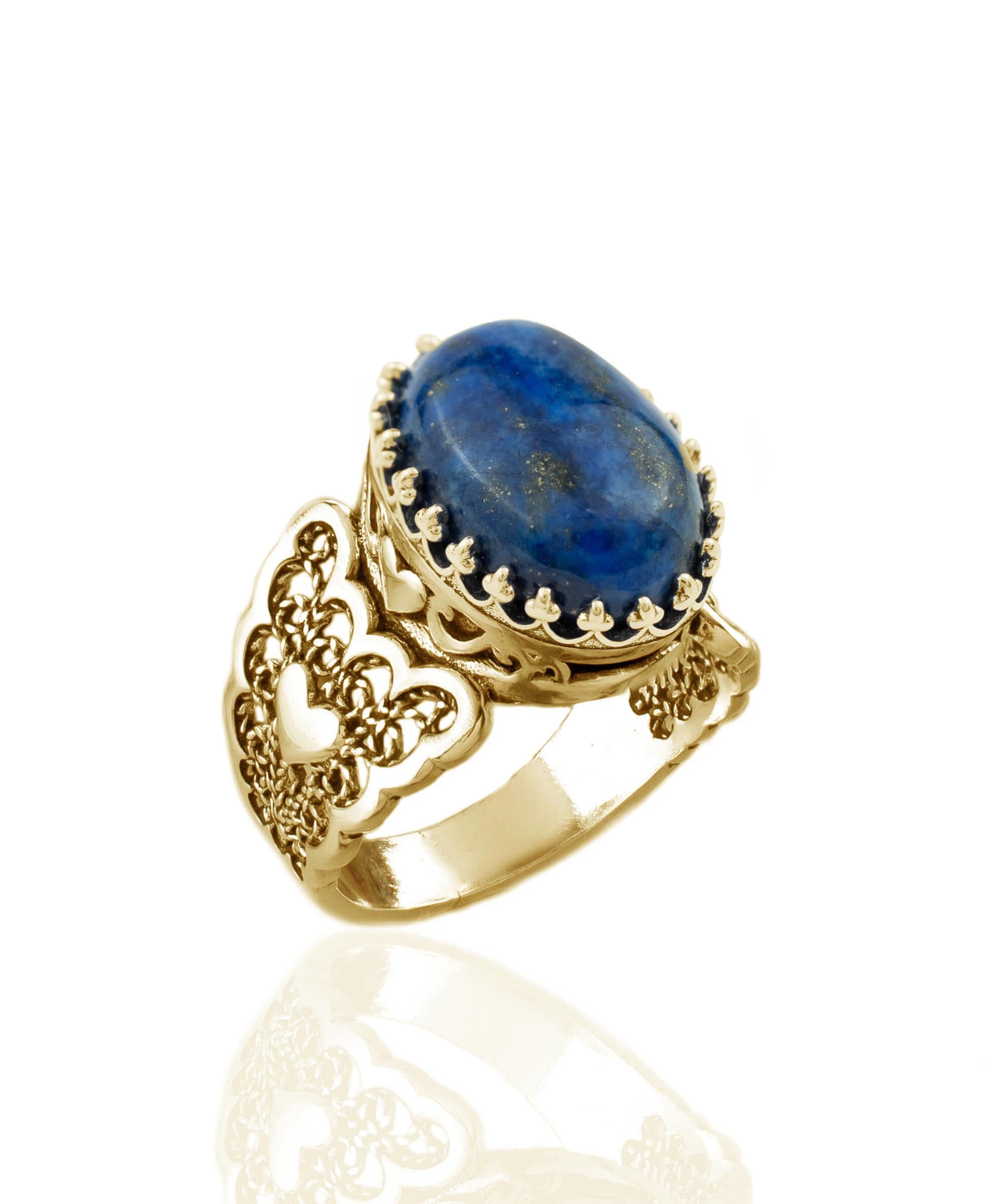 A beautiful gold plated cocktail ring featuring a double heart design with lapis lazuli gemstone, showcasing intricate filigree art.
