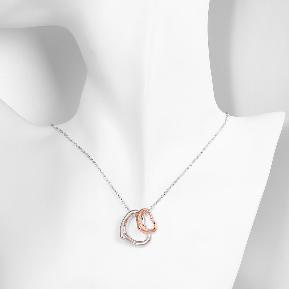 Elegant Double Heart Necklace in 18K Rose Gold Plated, featuring a unique design and hypoallergenic properties, displayed in a white gift box.