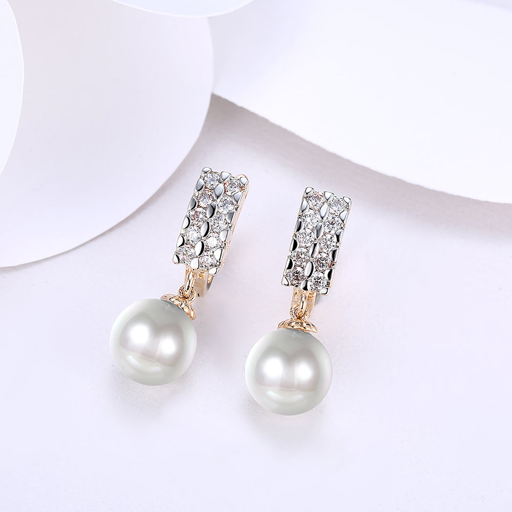 Elegant Double Row Freshwater Pearl Drop Huggie Earrings in 18K Gold Plated, showcasing their luxurious design and quality craftsmanship.