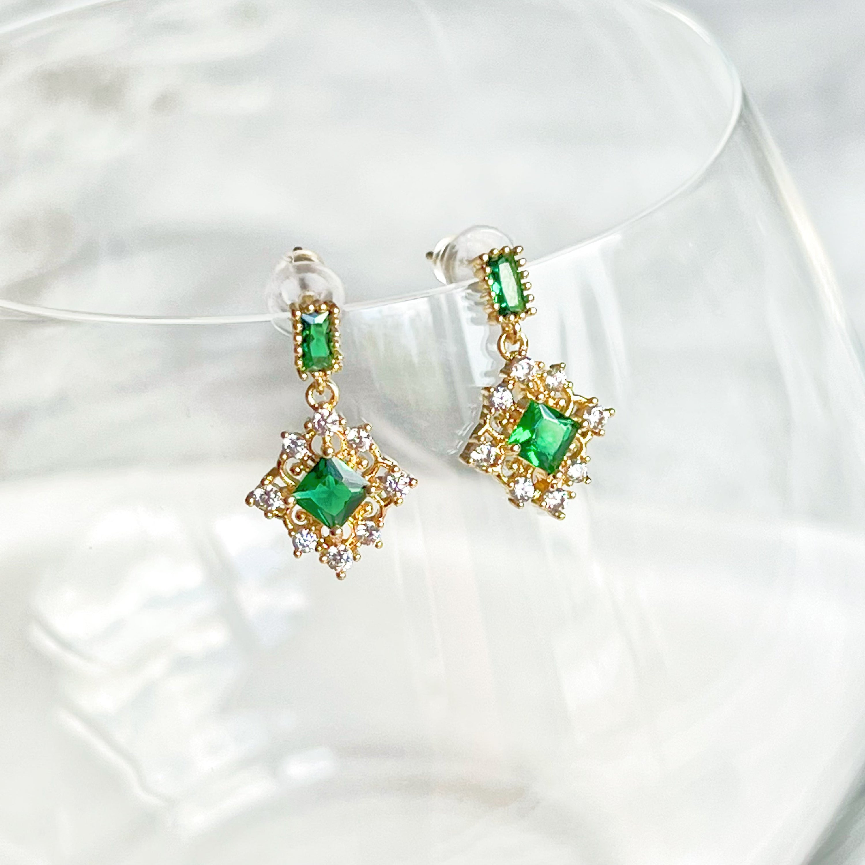 Elegant Double Square Emerald Green Crystal Drop Earrings with gold-plated bronze base and sterling silver ear studs.