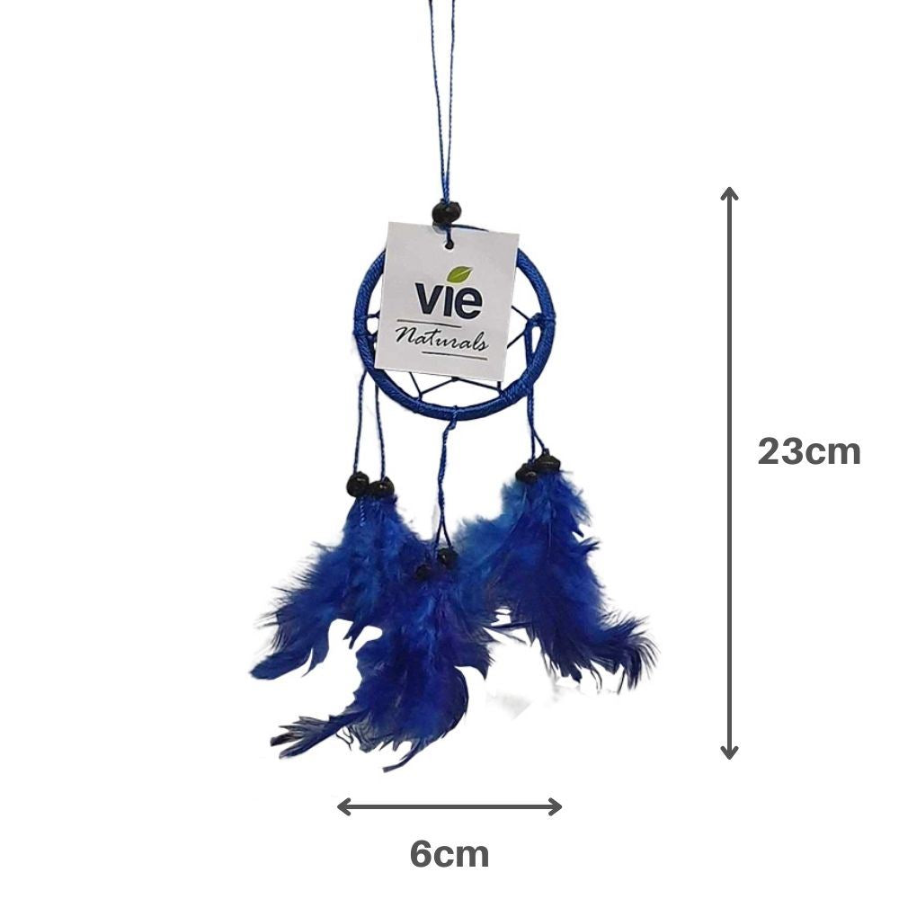 Handmade blue dream catcher with a 6cm ring, featuring a central bead and six feathers, symbolizing protection from negative dreams.