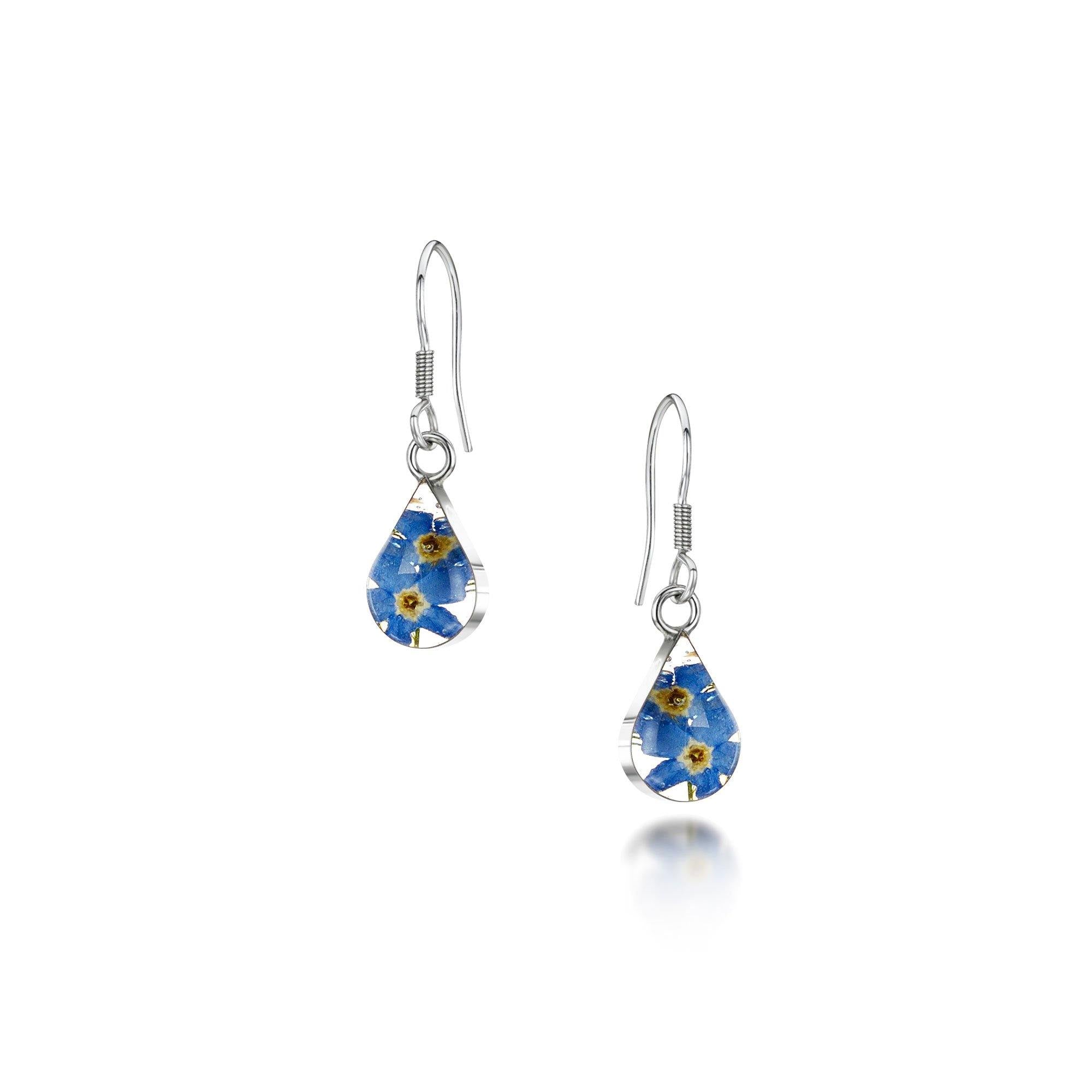 Handmade sterling silver drop dangle earrings featuring real forget-me-not flowers preserved in resin, elegantly presented in a gift box.