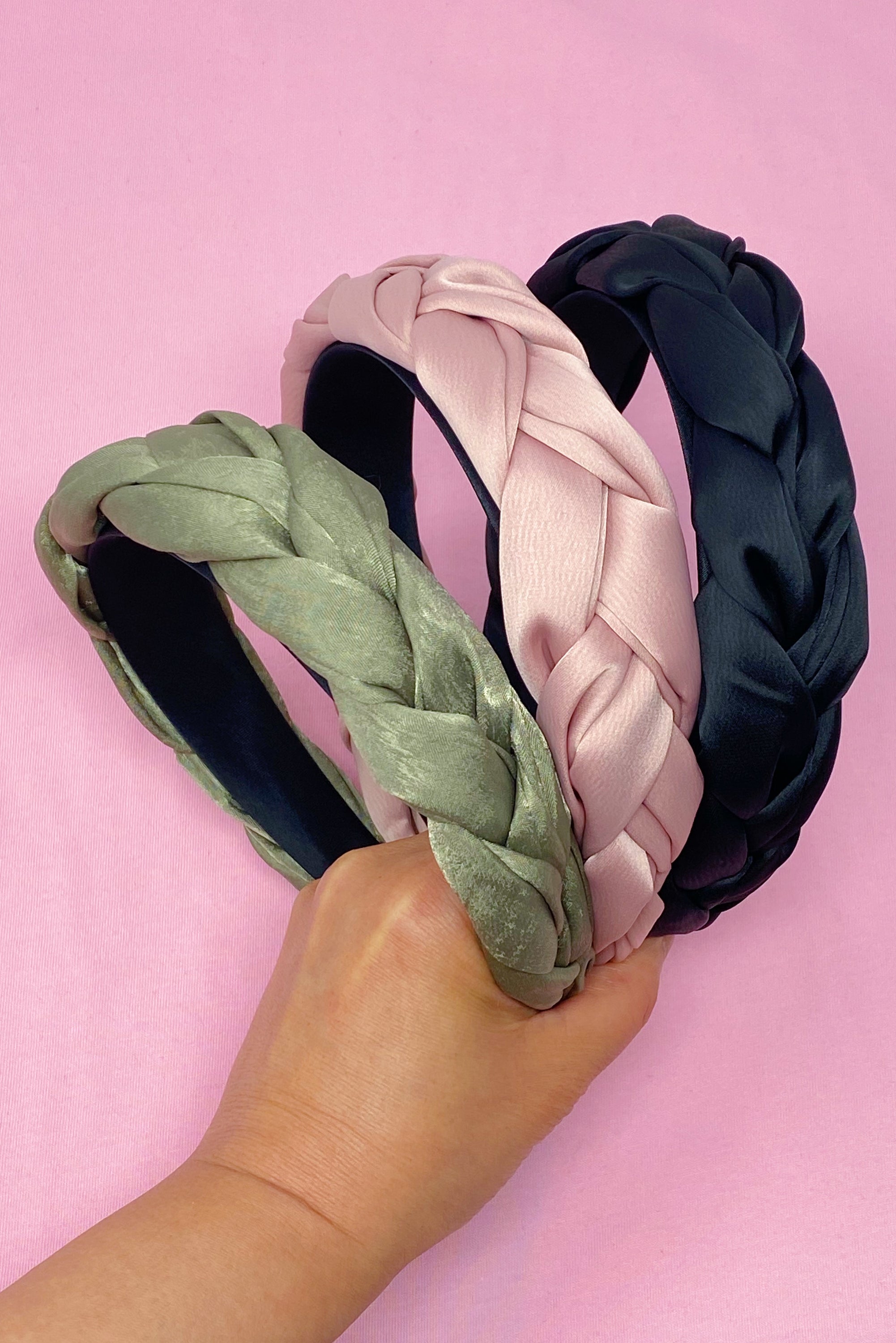 A stylish Dutch braid headband featuring soft edges, perfect for everyday wear and special occasions.