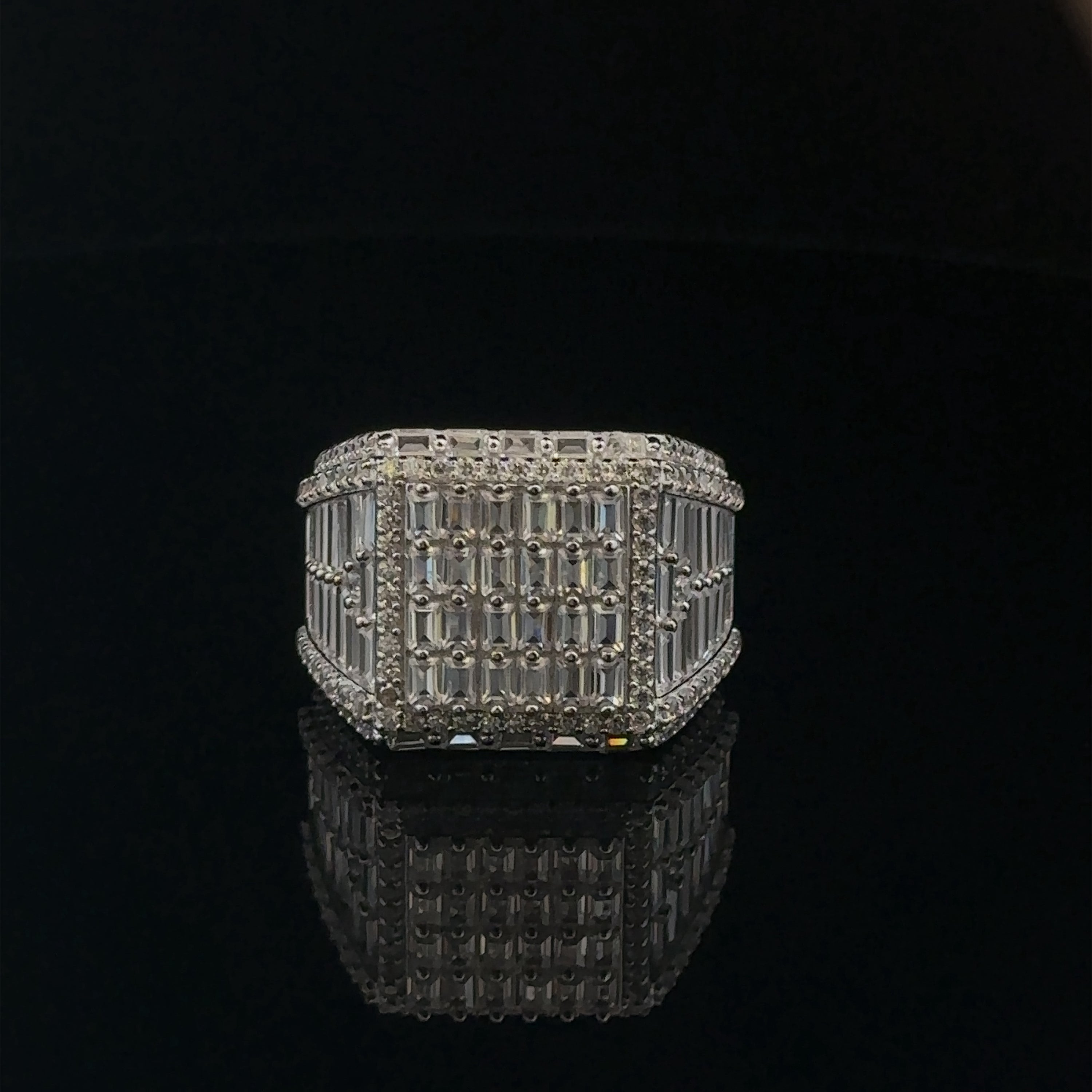 ECLAT 925 CZ Rhodium Men's Iced Out Ring featuring cubic zirconia stones on a polished silver band.