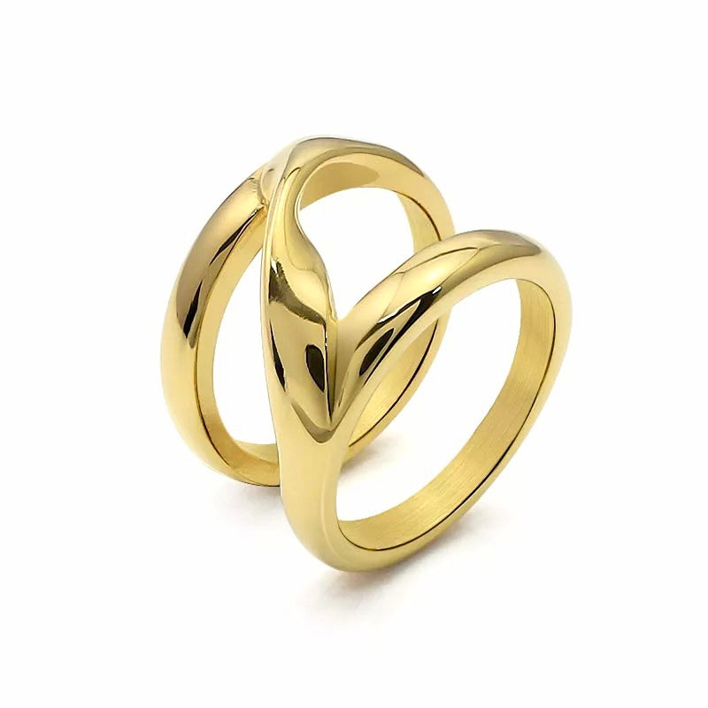 The Elan Ring featuring a fashion-forward design on an 18k gold plated band, showcasing its elegant and modern style.