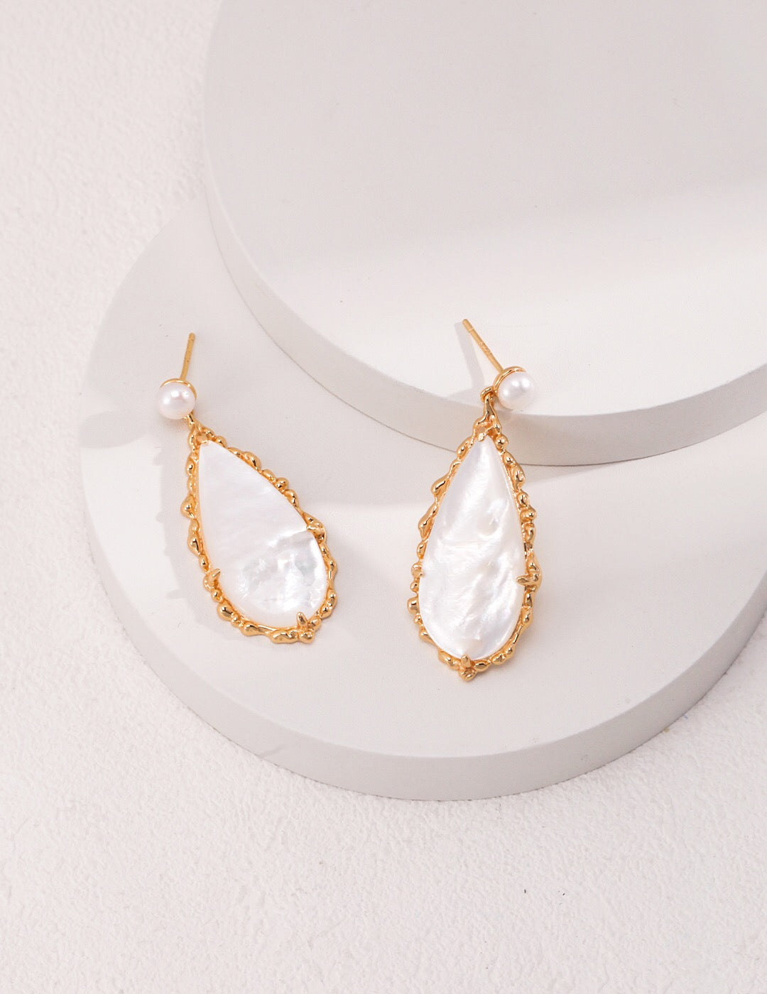 Elegance Pearl and Seashell Drop Earrings featuring freshwater pearls and gold vermeil, elegantly designed for a sophisticated look.