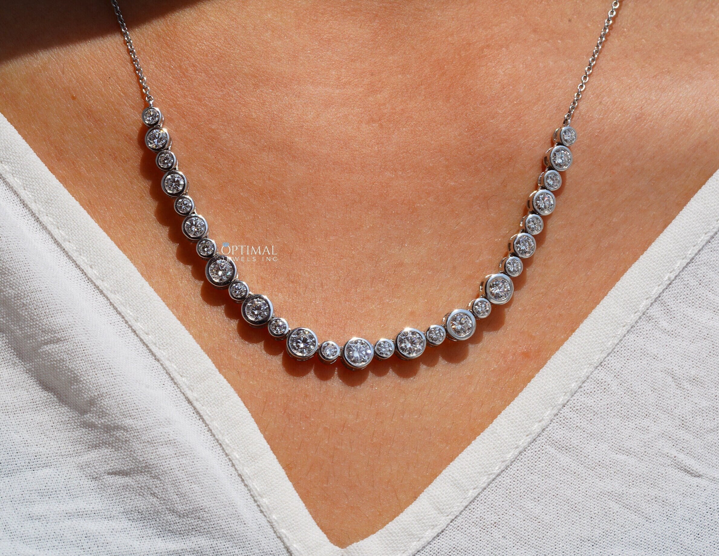 Elegant bezel set lab grown diamond necklace featuring 2.67 Ctw round cut diamonds on an 18-inch chain, perfect for special occasions.