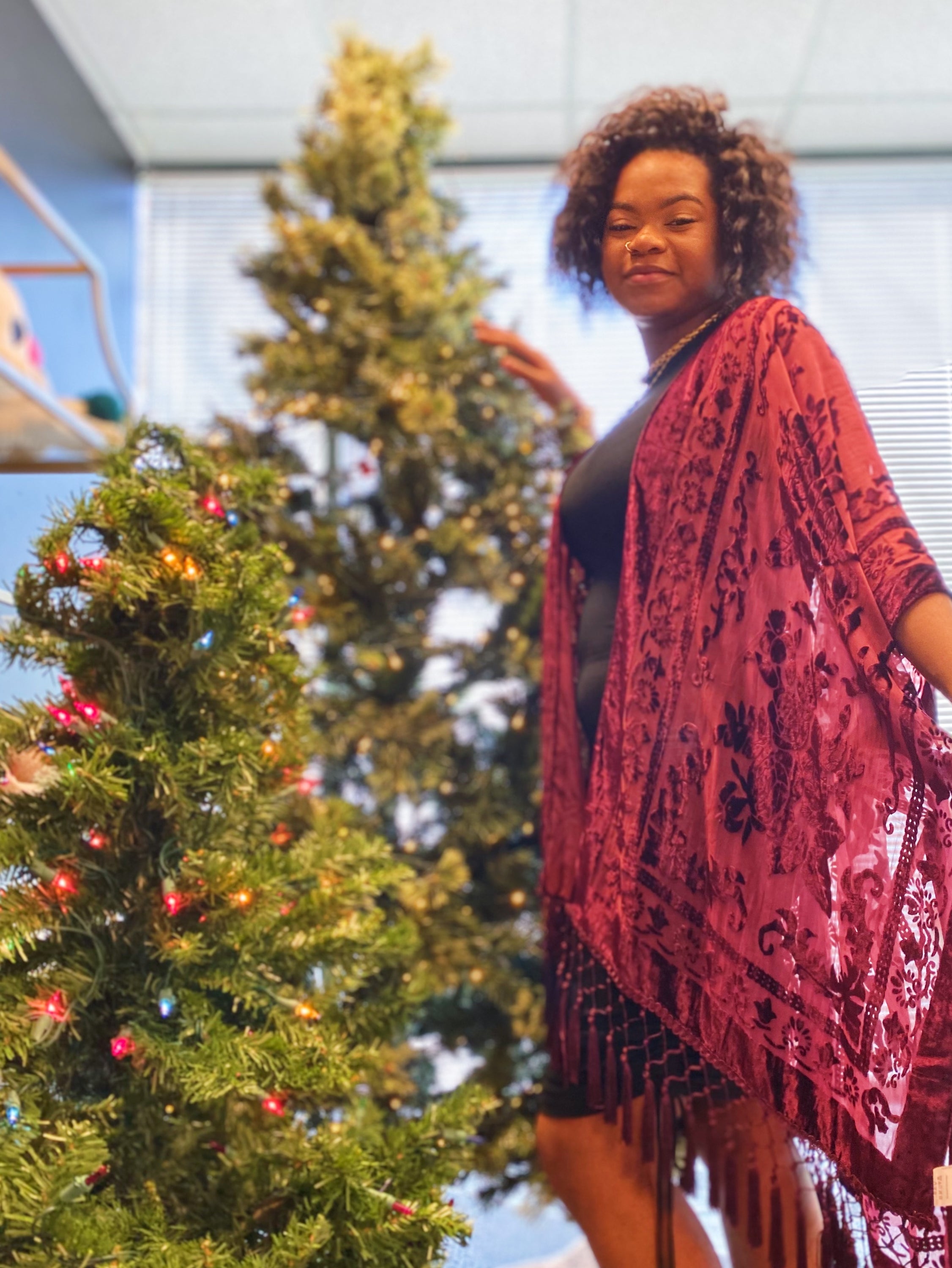 Elegant Boho Burnout Kimono featuring fringed bottoms and velvet details, showcasing its luxurious design and silky tassels.