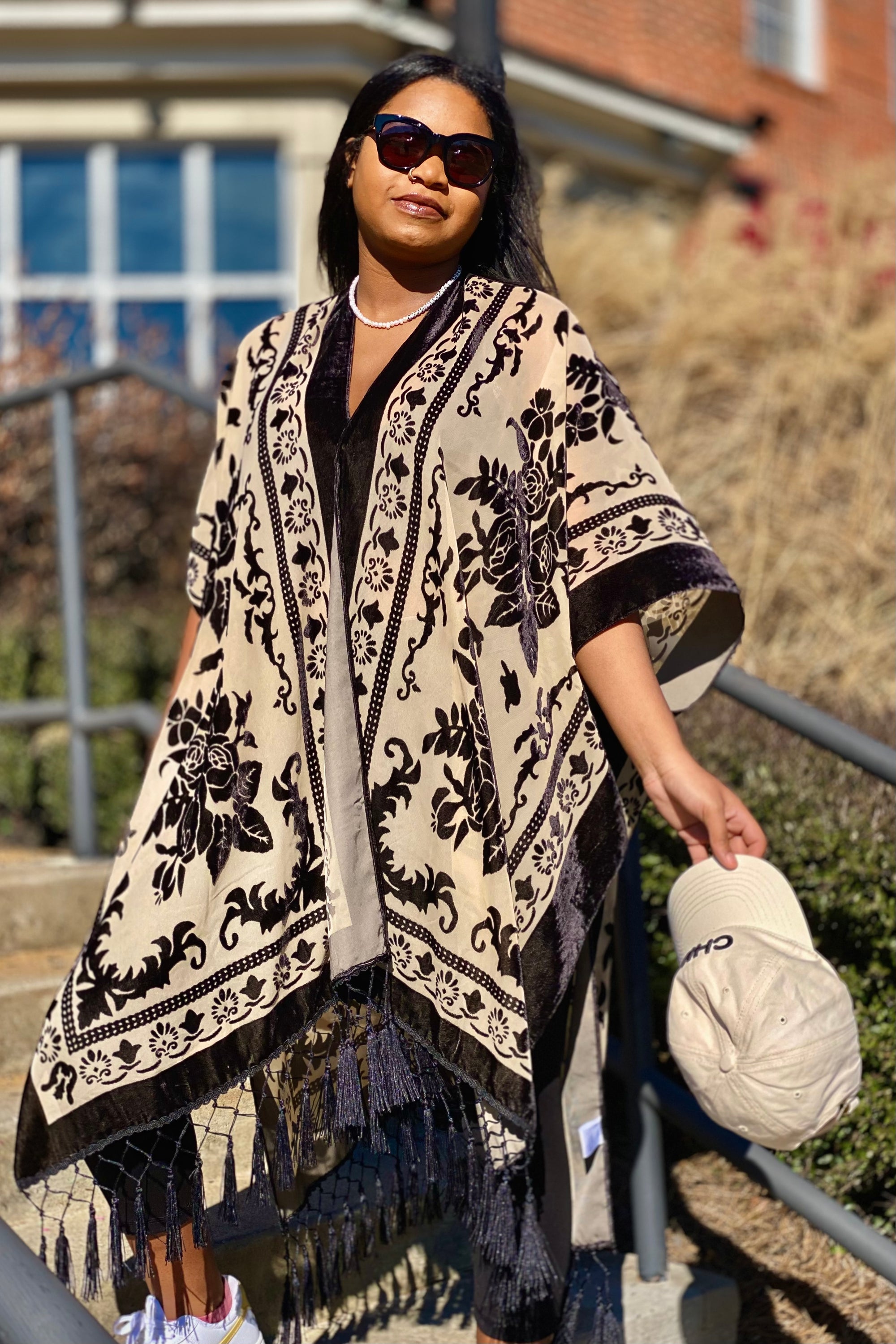 Elegant Boho Burnout Kimono featuring fringed bottoms and velvet details, showcasing its luxurious design and silky tassels.
