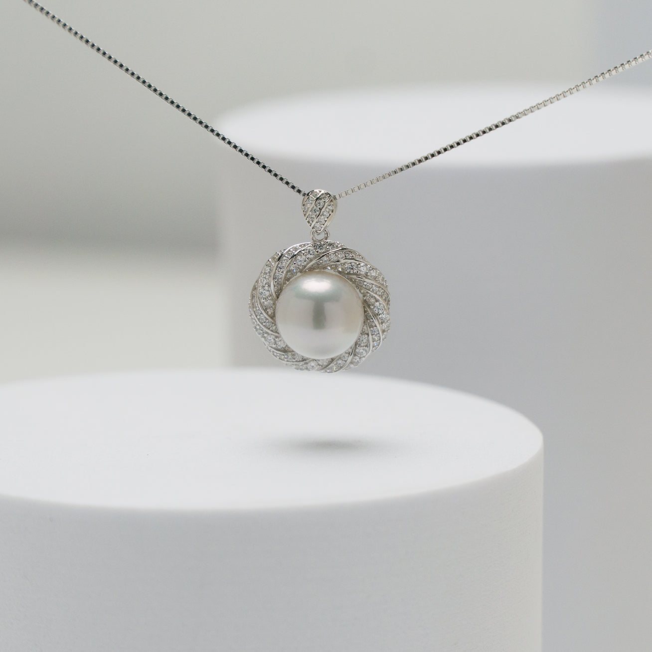 Elegant Edison Pearl Necklace featuring a 12-13mm lustrous pearl and cubic zirconia accents on Sterling Silver with 18k Gold Plating.