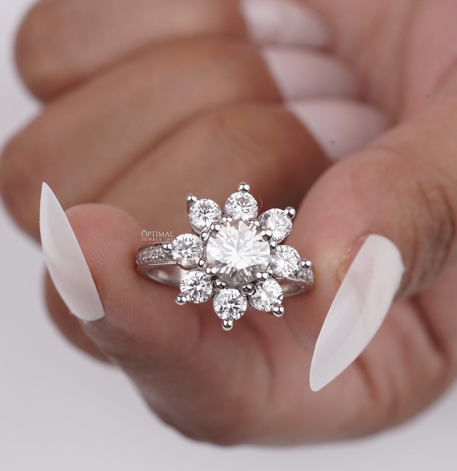 Elegant Flower Halo Diamond Ring featuring a 2.60 ct lab-created round diamond in a white gold pave band, showcasing intricate floral design.