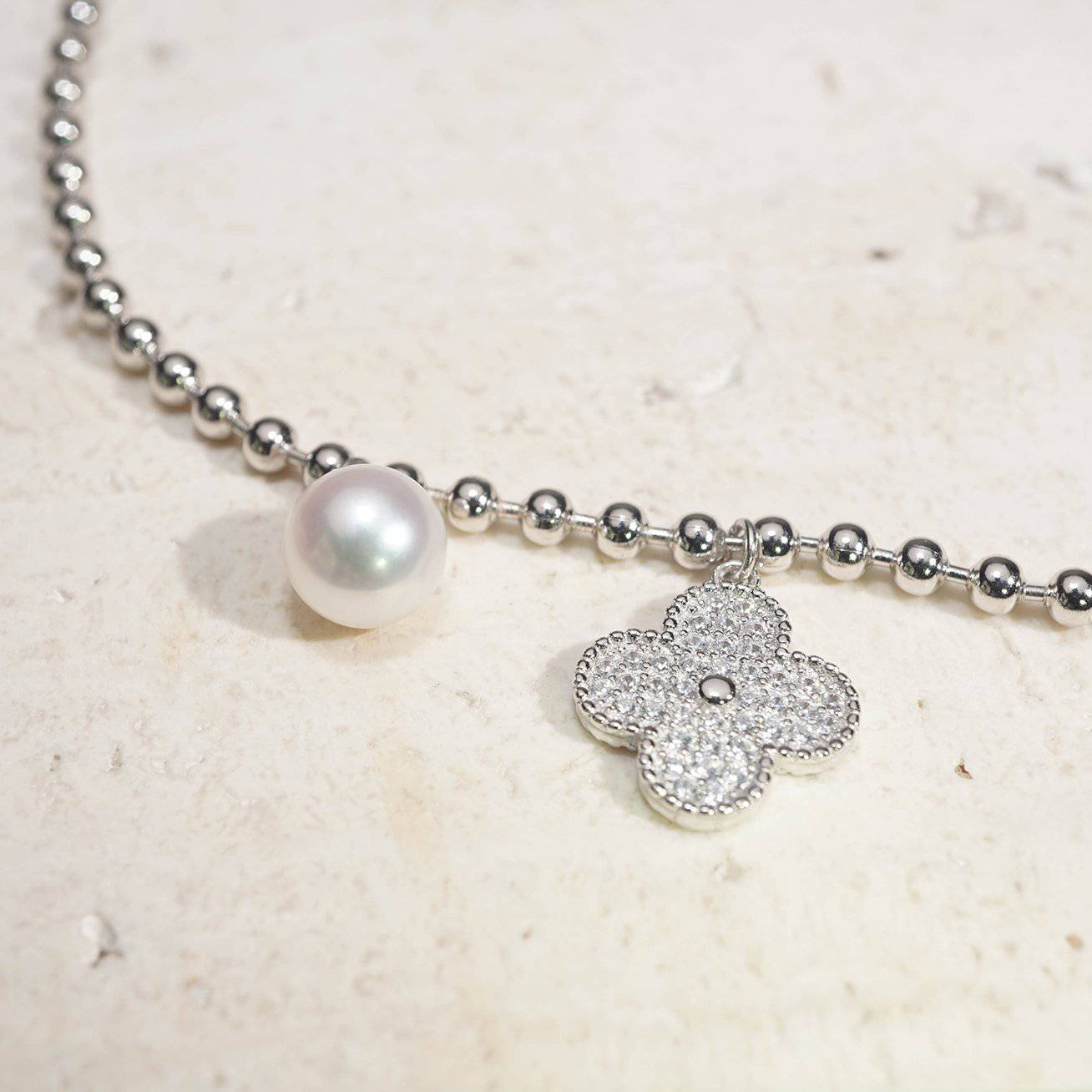 Elegant Freshwater Pearl Bracelet WB00068 featuring a silver ball chain, freshwater pearl, and candied flower charm.