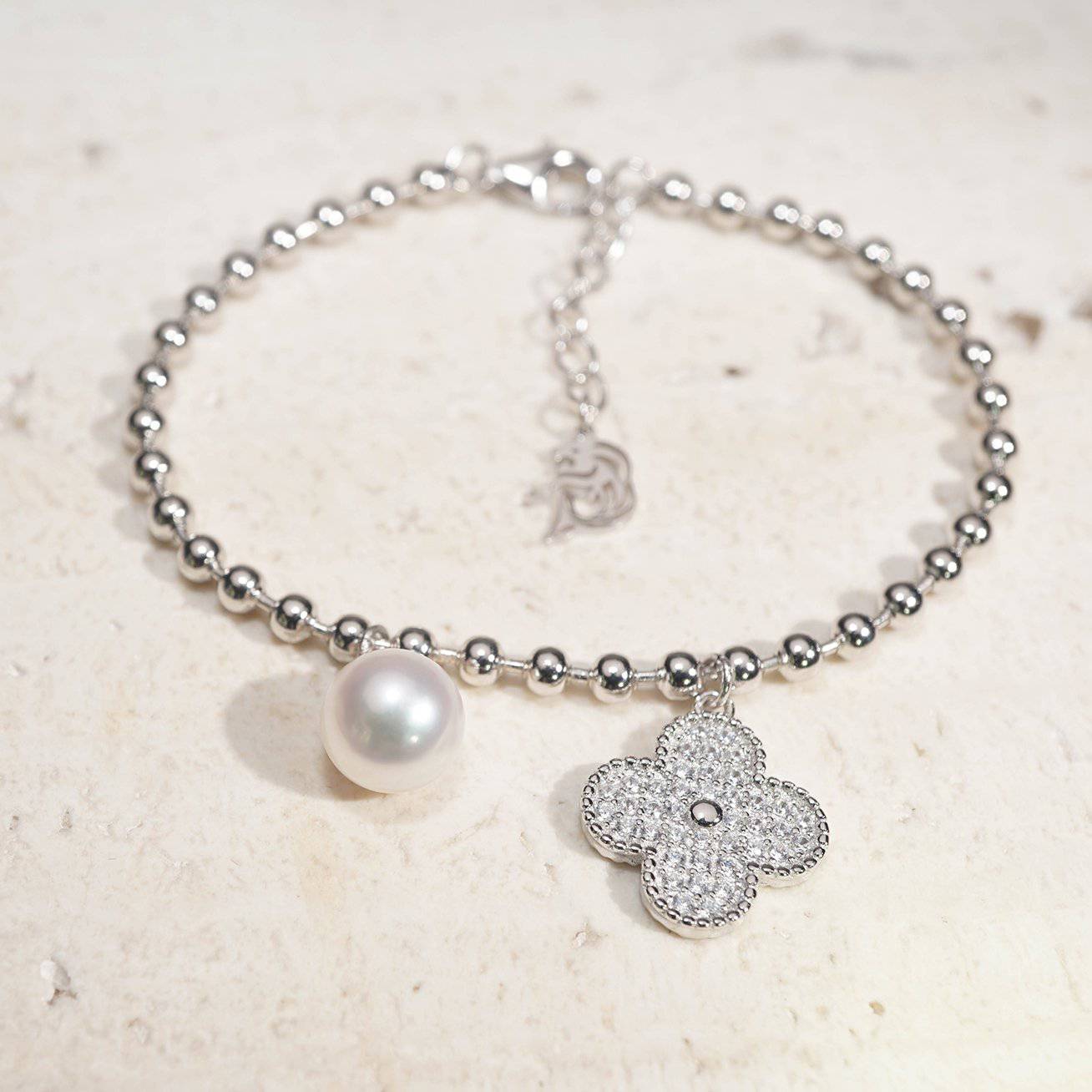 Elegant Freshwater Pearl Bracelet WB00068 featuring a silver ball chain, freshwater pearl, and candied flower charm.