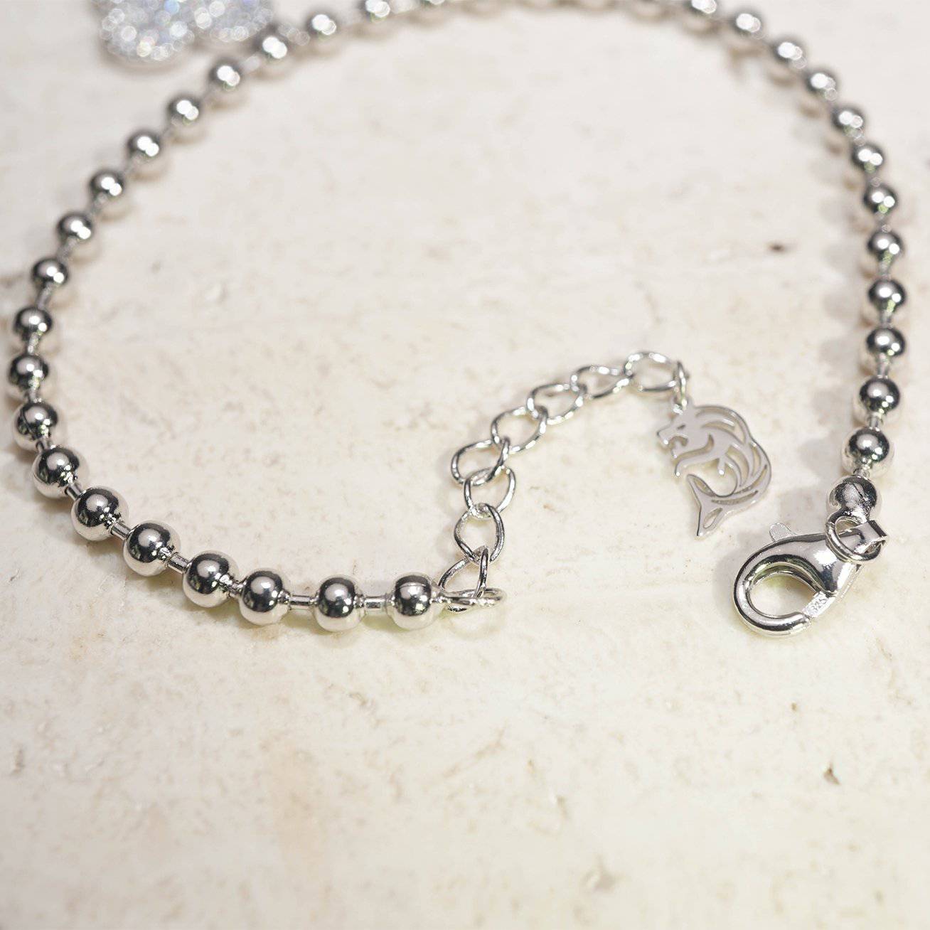 Elegant Freshwater Pearl Bracelet WB00068 featuring a silver ball chain, freshwater pearl, and candied flower charm.