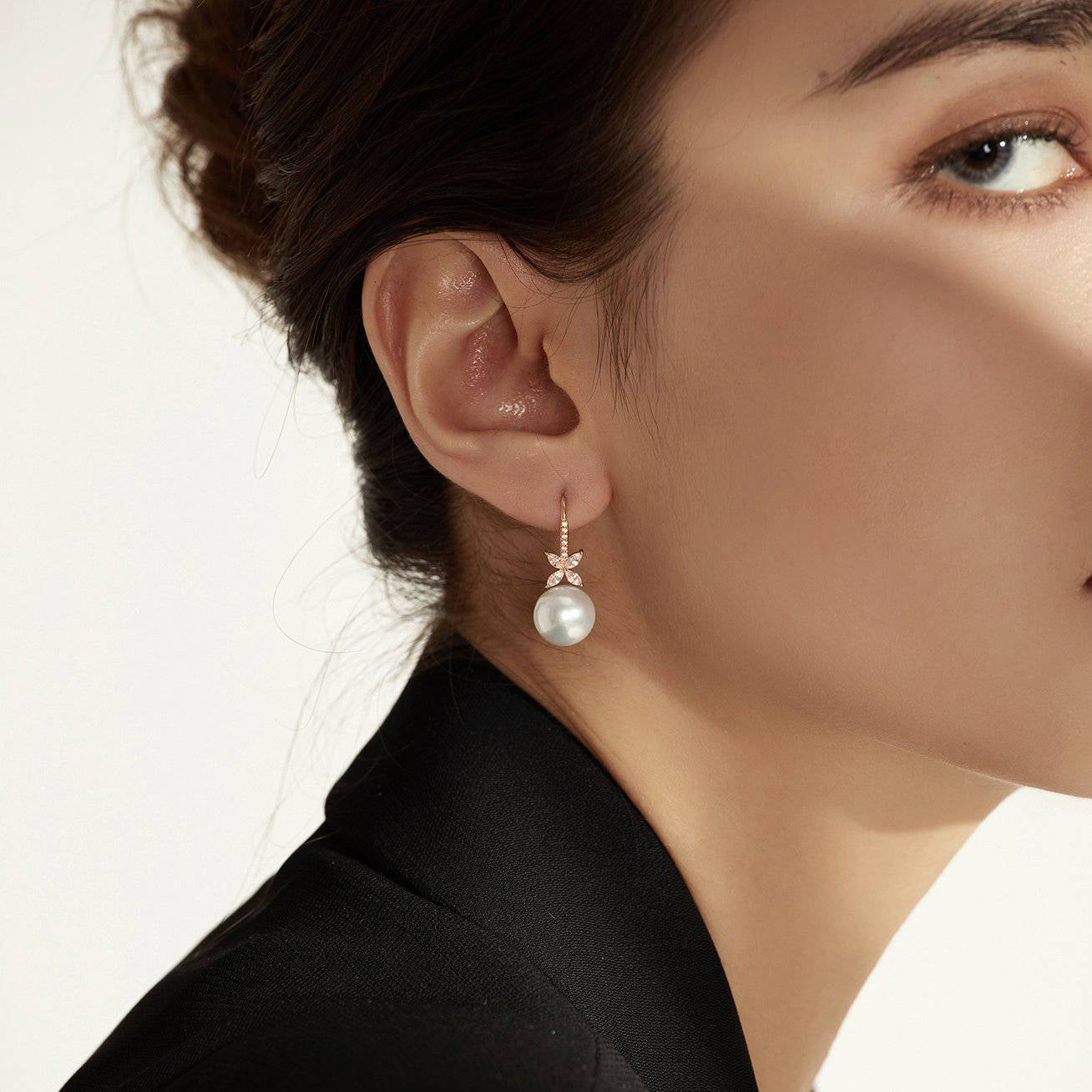 Elegant Freshwater Pearl Earrings in rose gold with 8.5-9.5mm white pearls and cubic zirconia accents.