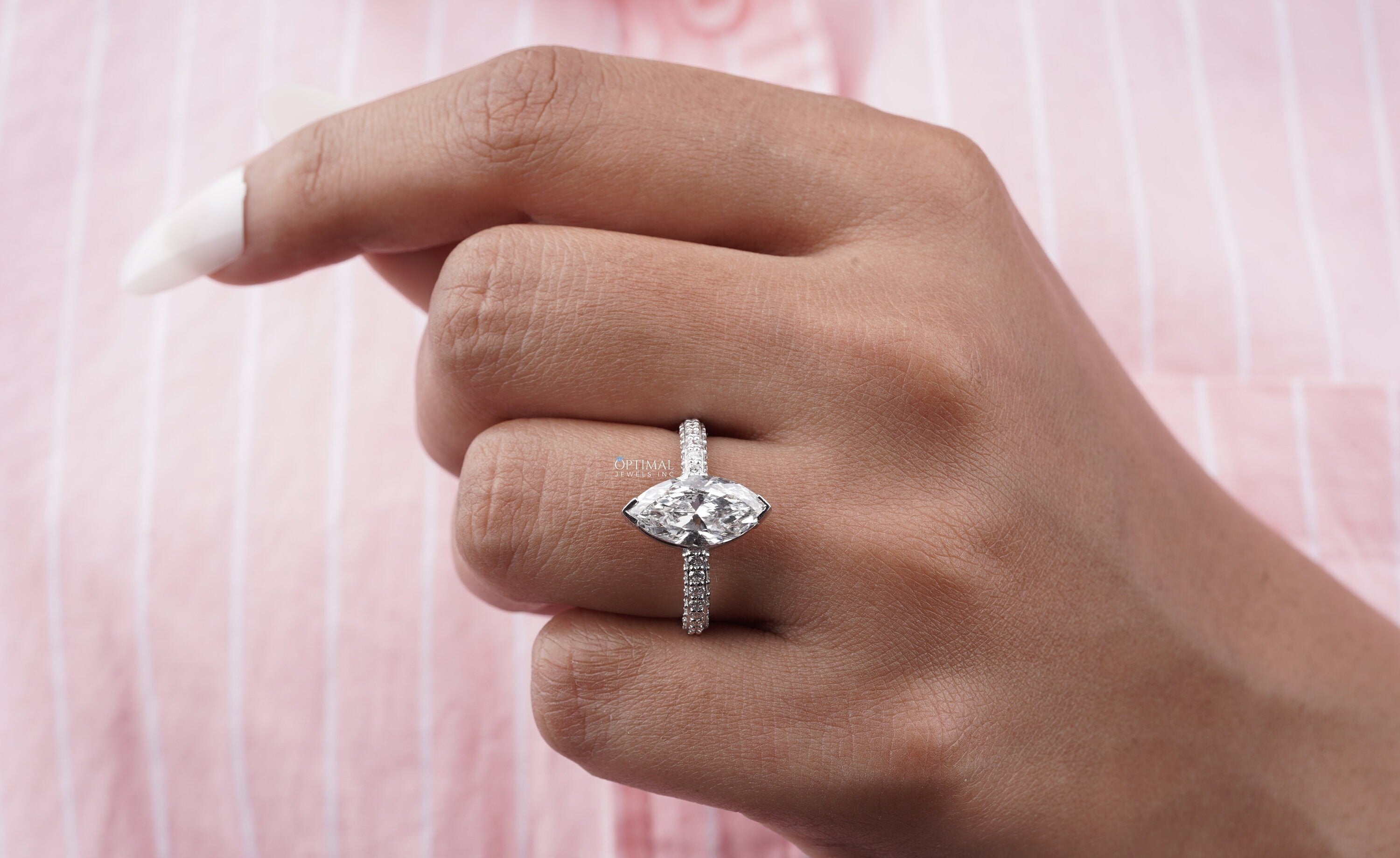 Elegant Marquise Cut Diamond Ring featuring a 2.20 Ctw lab-grown diamond in a pave setting, crafted in white gold.